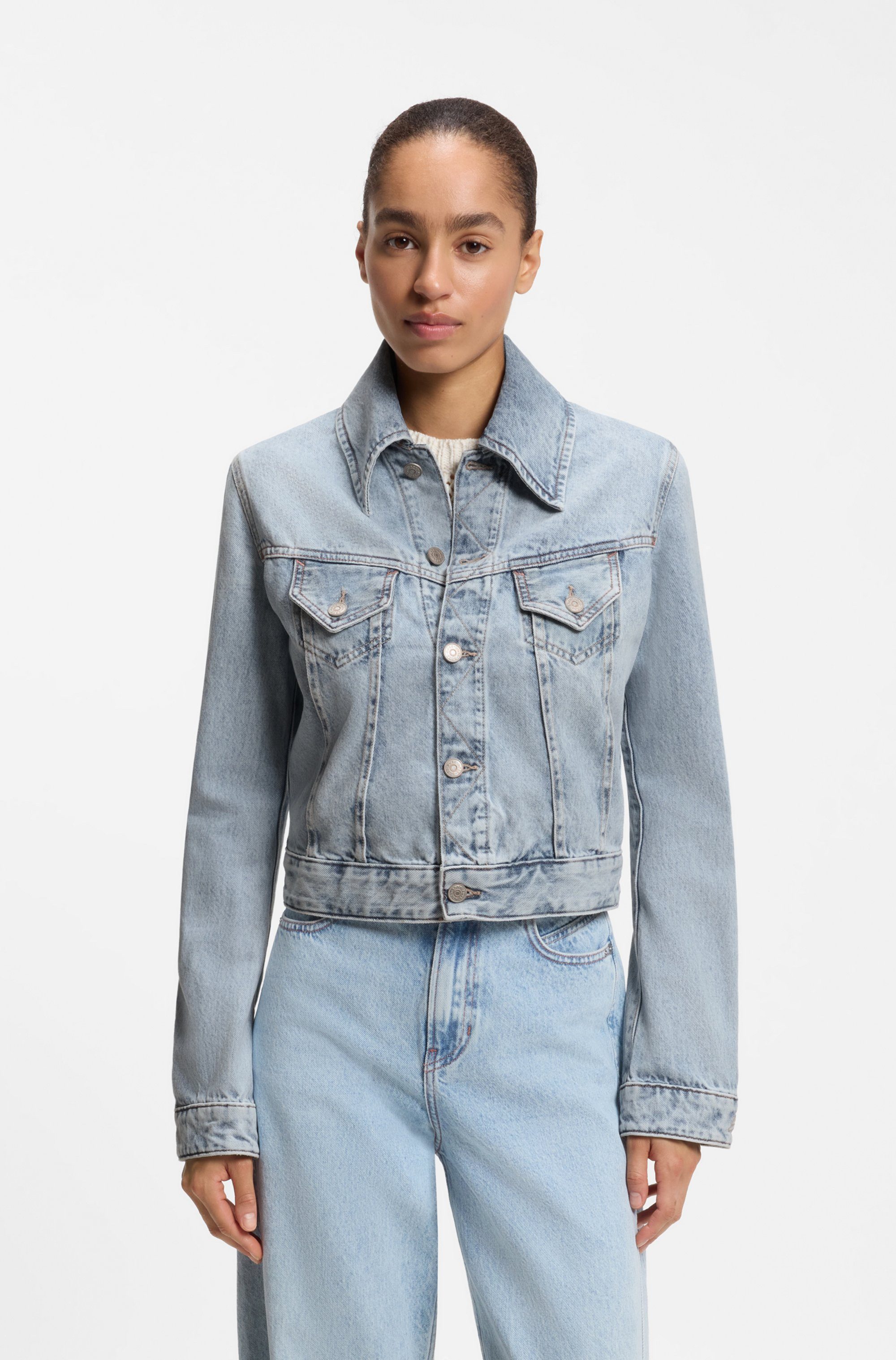 BOSS ORANGE Jeansjacke TRUCKER JKT Premium Damenmode aus Baumwoll-Denim, Slim Fit