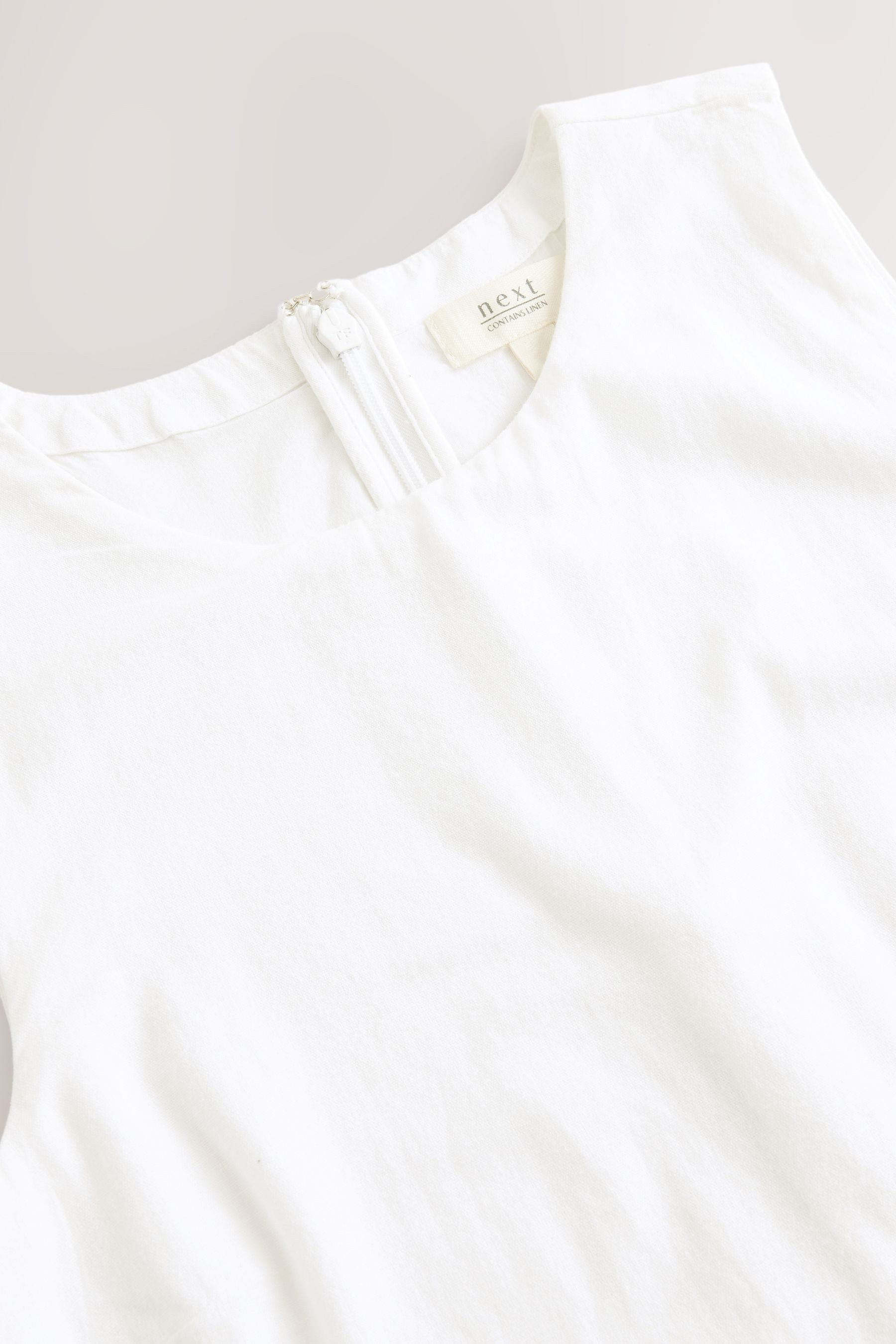 Next Playsuit Ärmelloser Playsuit mit Bogenkanten (1-tlg) günstig online kaufen