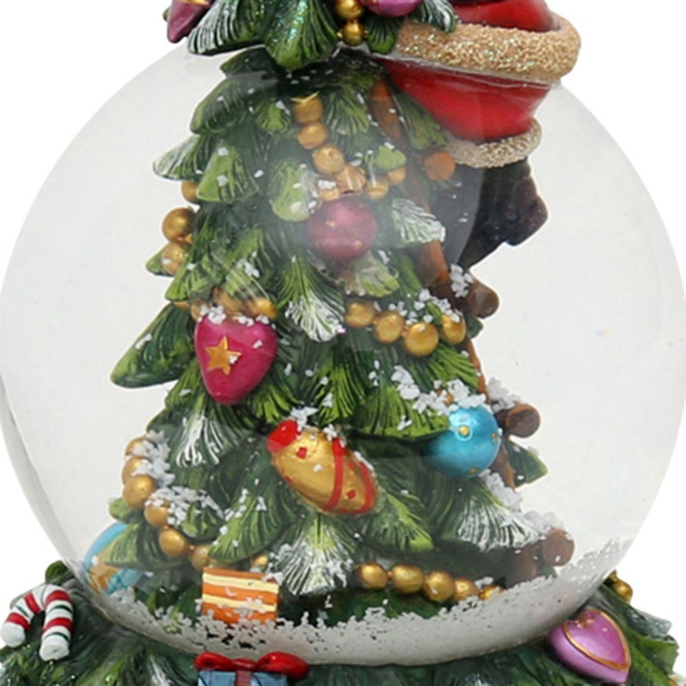 Dekohelden24 Schneekugel Schneekugel, Tannenbaum mit Spieluhr (1 St)