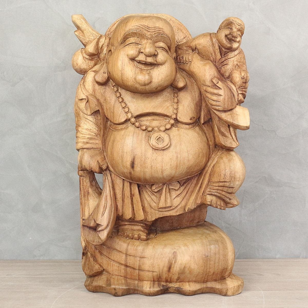 Oriental Galerie Dekofigur Holzfigur Happy Buddha Massiv mit Buddha auf Schulter 50 cm (1 St), traditionelle Herstellung in Handarbeit im Ursprungsland