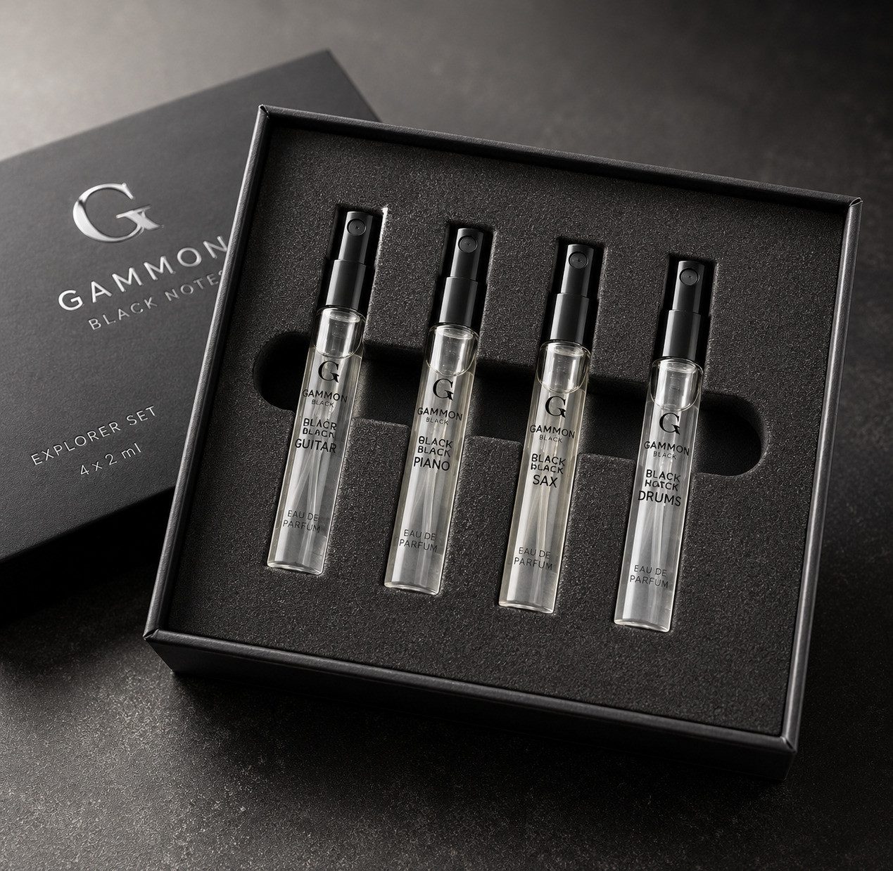 GAMMON Eau de Parfum GAMMON 9489 Black Notes Parfum Explorer-Set (4x2 ml) 20% Parfum-Öl, 1-tlg., Je nach Ausführung ein unterschiedliches Duftensemble