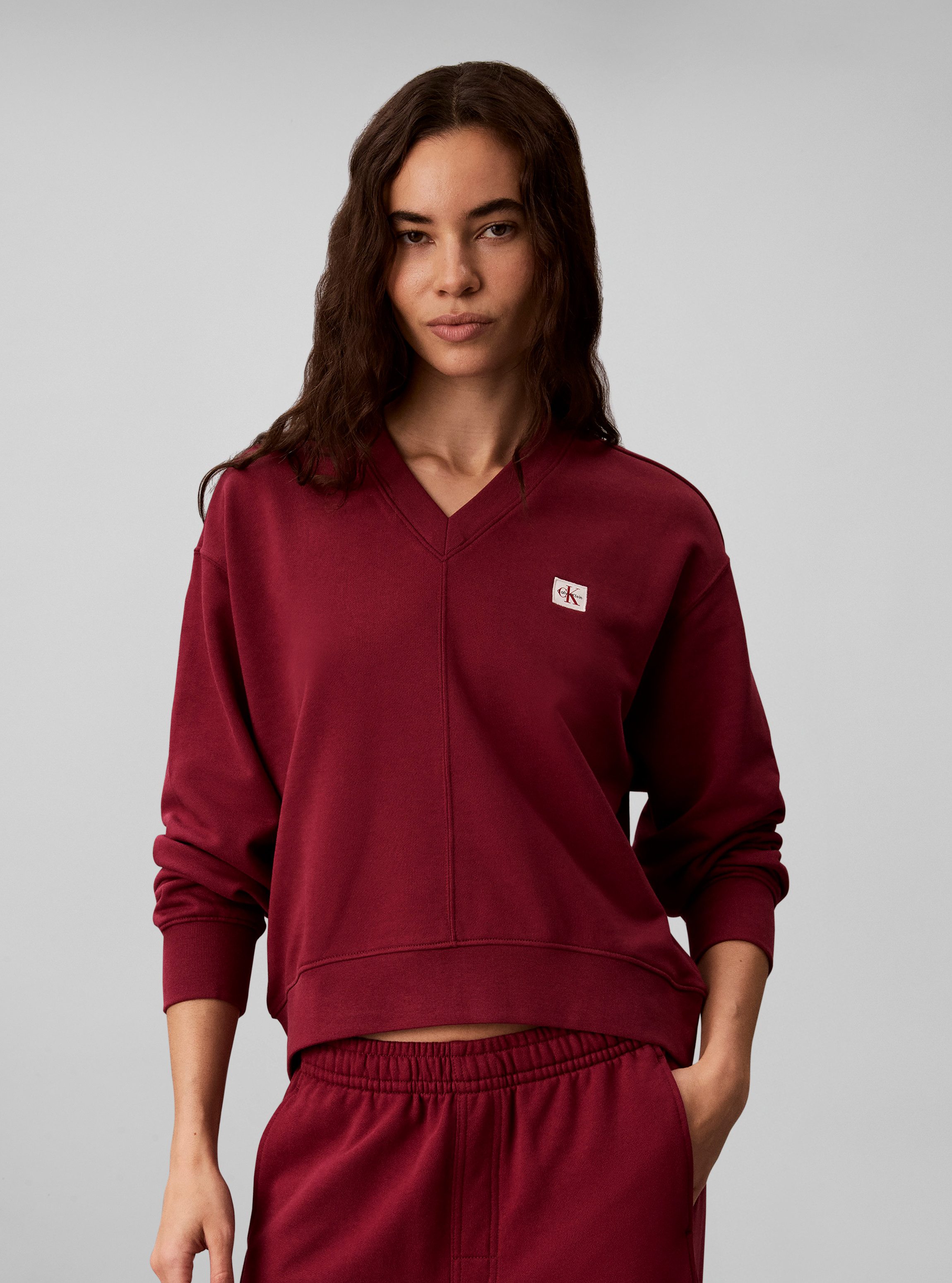 Calvin Klein Jeans Sweatshirt LS TERRY WOVEN LABEL VNK SWEATSH Regular fit mit V-Ausschnitt