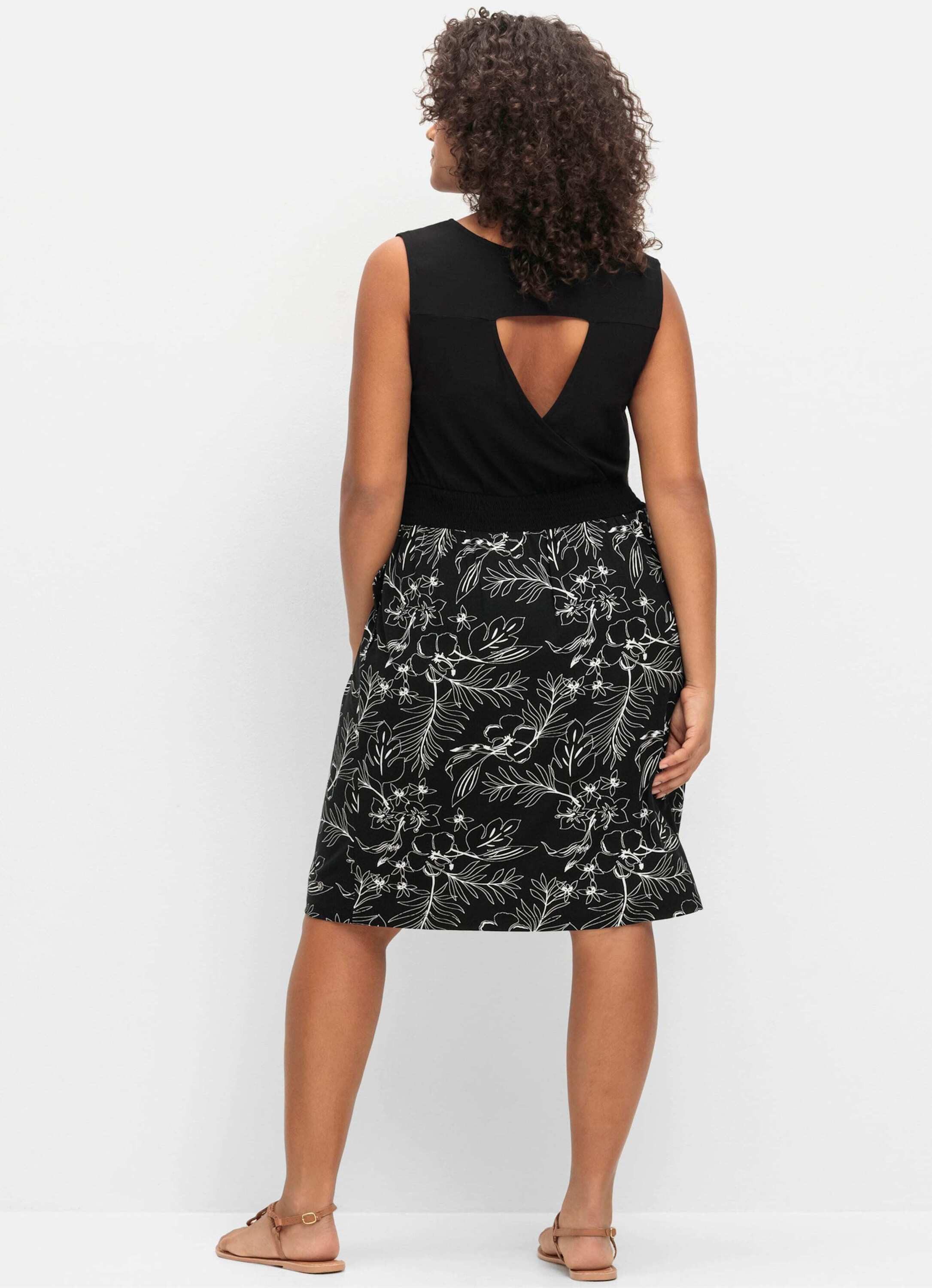 Sheego Etuikleid Jerseykleid Ärmellos in Wickeloptik, mit Cut-out hinten günstig online kaufen