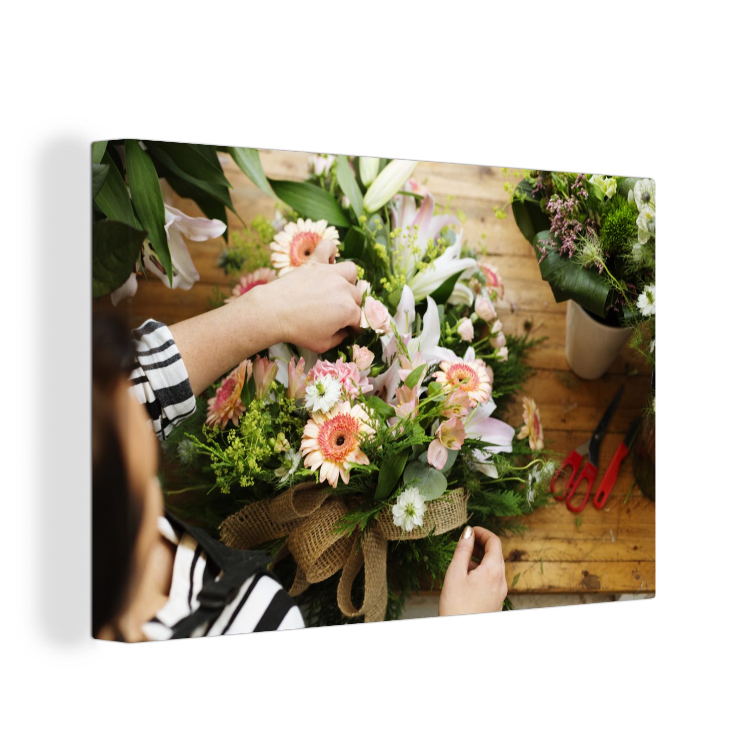 OneMillionCanvasses® Leinwandbild Florist macht einen Blumenstrauß aus Blumen, (1 St), Wandbild Leinwandbilder, Aufhängefertig, Wanddeko, 30x20 cm