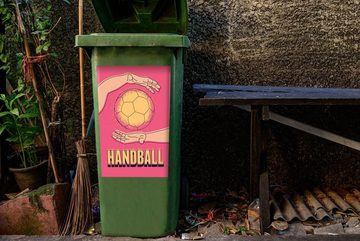 MuchoWow Wandsticker "Handball" auf einem rosa Hintergrund (1 St), Mülleimer-aufkleber, Mülltonne, Sticker, Container, Abfalbehälter