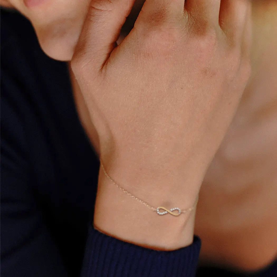 Suzan Gold Charm-Armband 375 Echtgold Infinity Glow Zirkonia