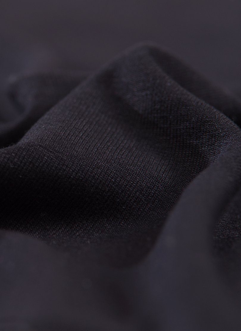 Trigema Schlafanzug TRIGEMA mit Schlafanzug Affen-Druckmotiv schwarz