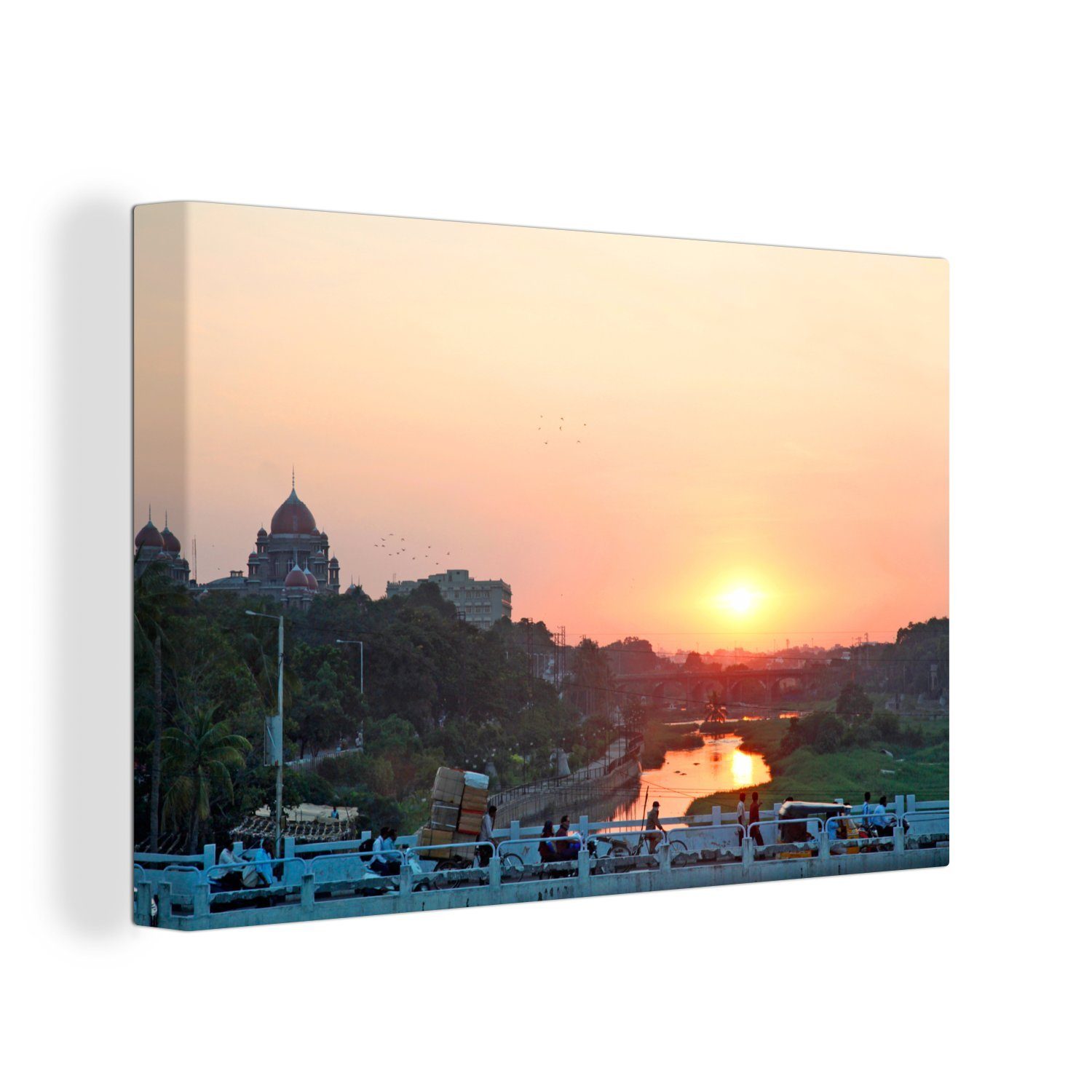 Super günstig AUS OneMillionCanvasses® Leinwandbild St), in Der (1 Aufhängefertig, Sonnenuntergang Hyderabad Metropole in 30x20 cm Leinwandbilder, Wandbild Asien, der Wanddeko