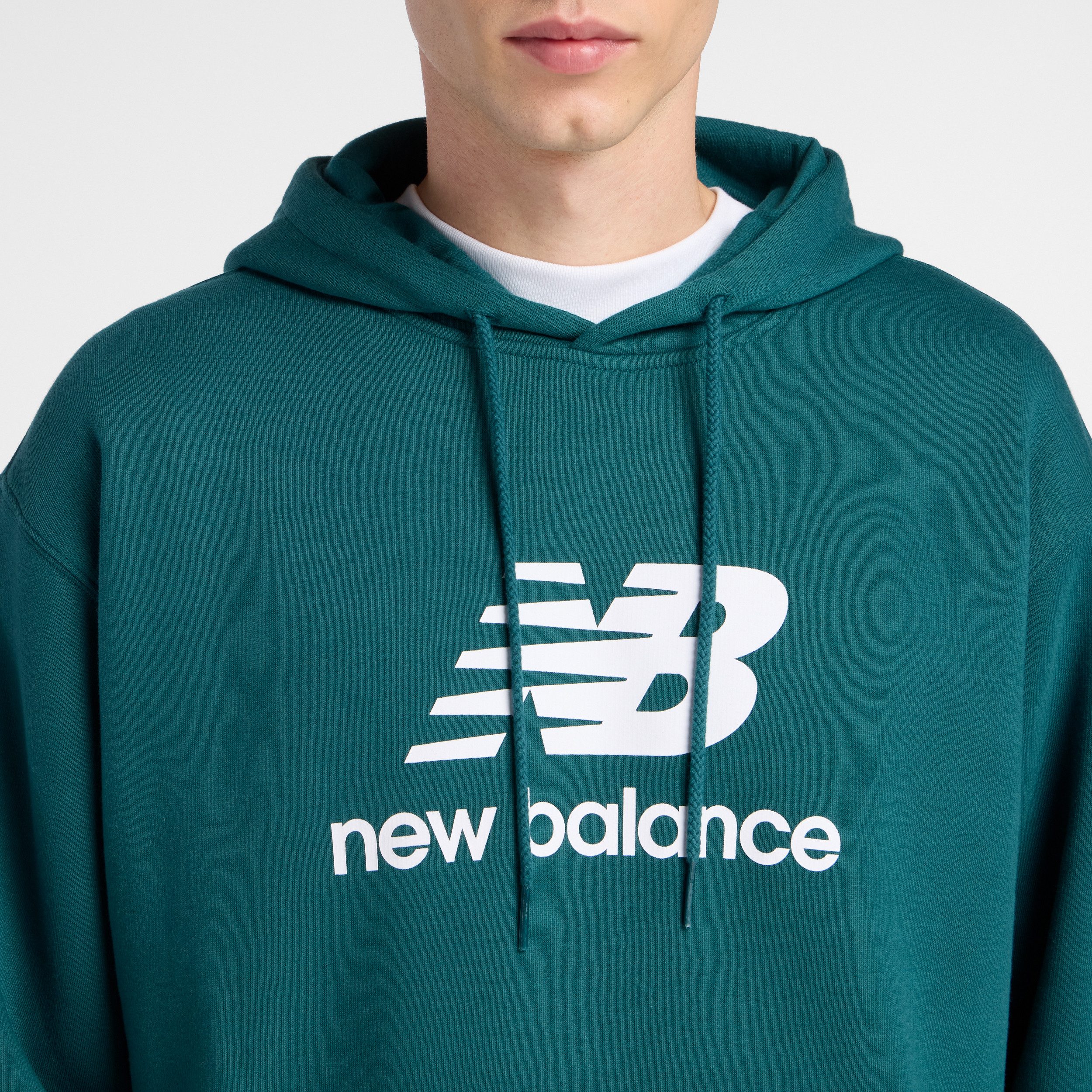 New Balance Kapuzensweatshirt sportlicher Stil, mit Kordelzug an der Kapuze, mit Kängurutasche