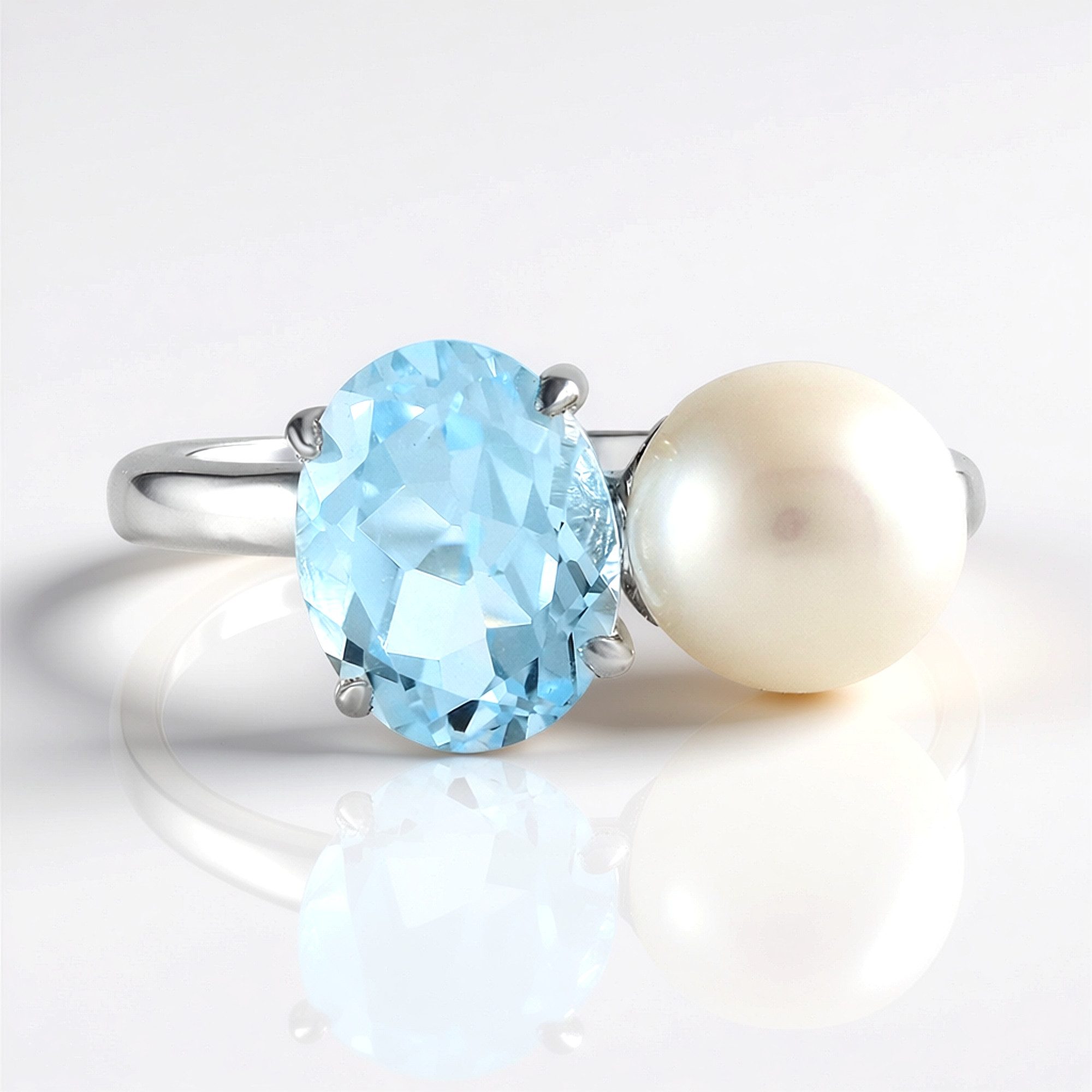 Cavill Perlenring Cavill Ring mit 2,00 ct himmelblauem Topas, Zuchtperle, 925 Silber (1-tlg)