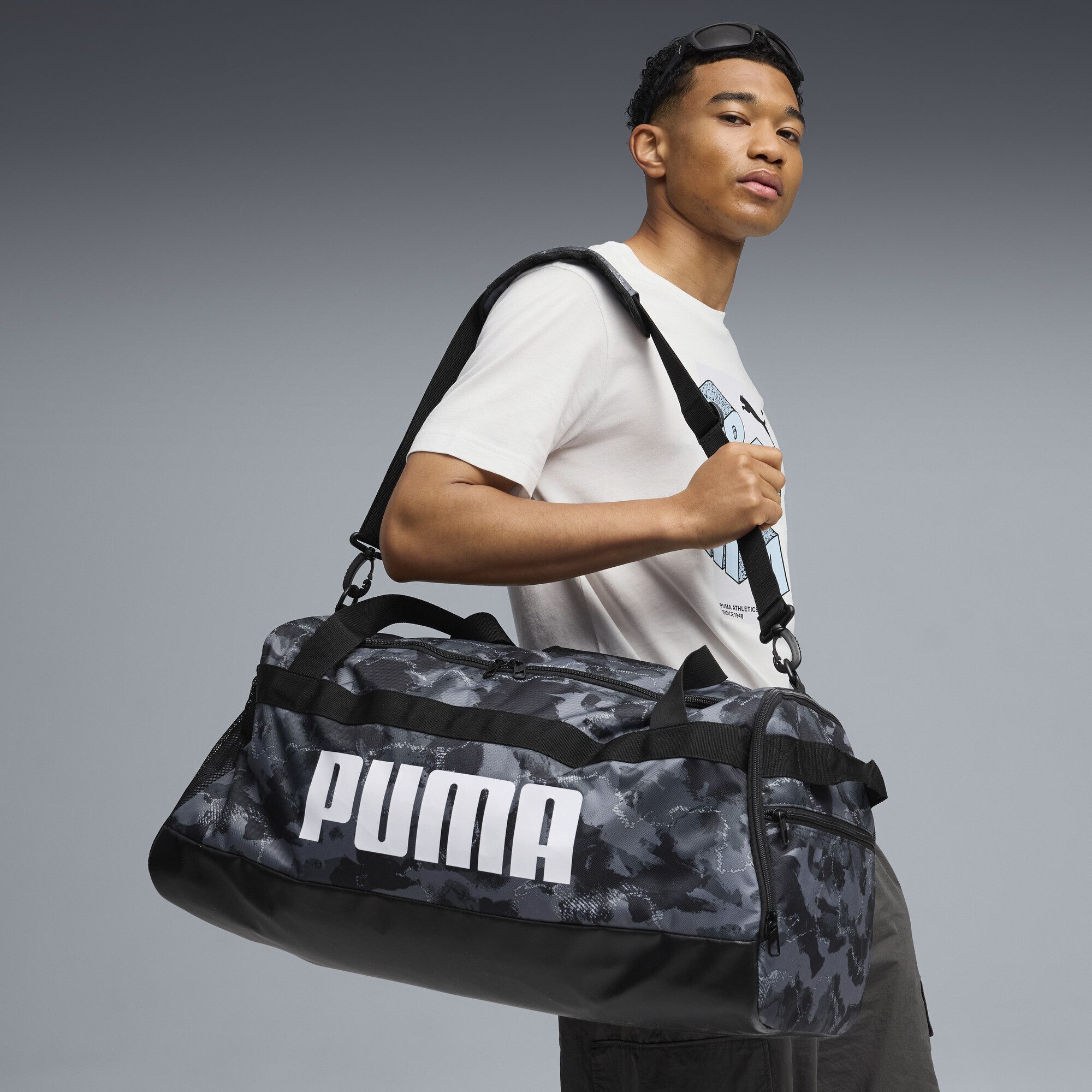 PUMA Sporttasche Challenger 58L Mittelgroße Sporttasche mit Allover-Print günstig online kaufen