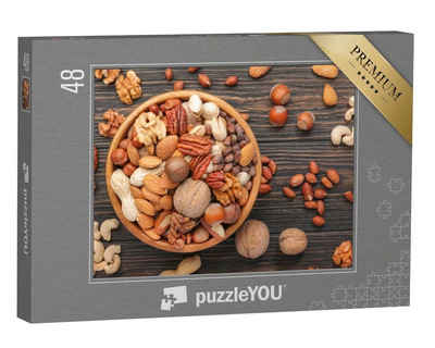 puzzleYOU Puzzle Sortiment von Nüssen in einer Schale, 48 Puzzleteile, puzzleYOU-Kollektionen Nüsse