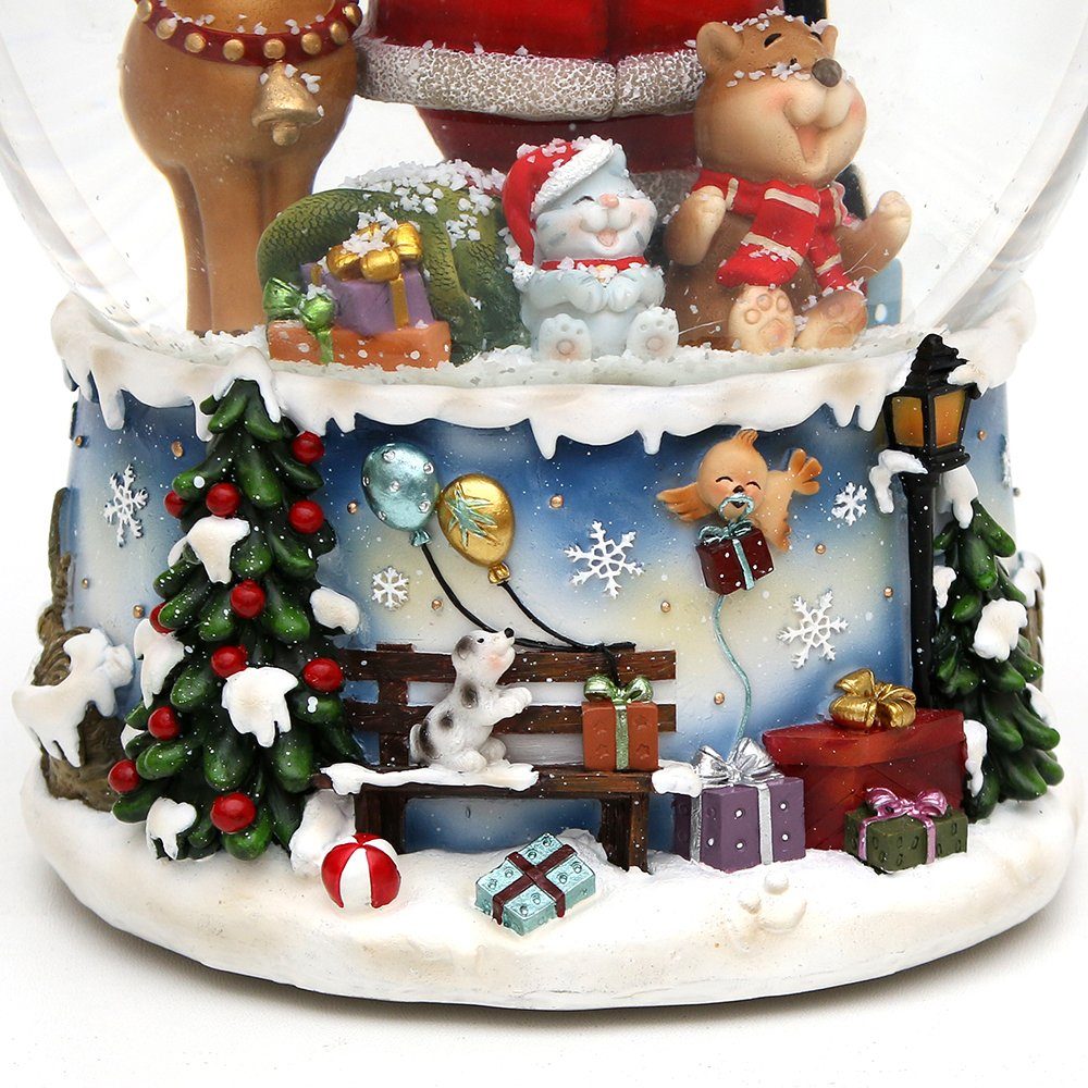 Dekohelden24 Schneekugel XXL Schneekugel, Santa mit lustigem Elch, mit Spielwerk, Melodie: (1 St)