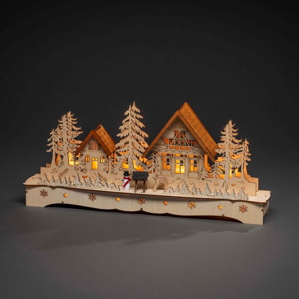 KONSTSMIDE Weihnachtsdorf Weihnachtsdeko, LED Holzsilhouette, Dorf mit  Schneemann und Rentier, Trafobetriebener und batteriebetriebener Artikel  für den Innenbereich