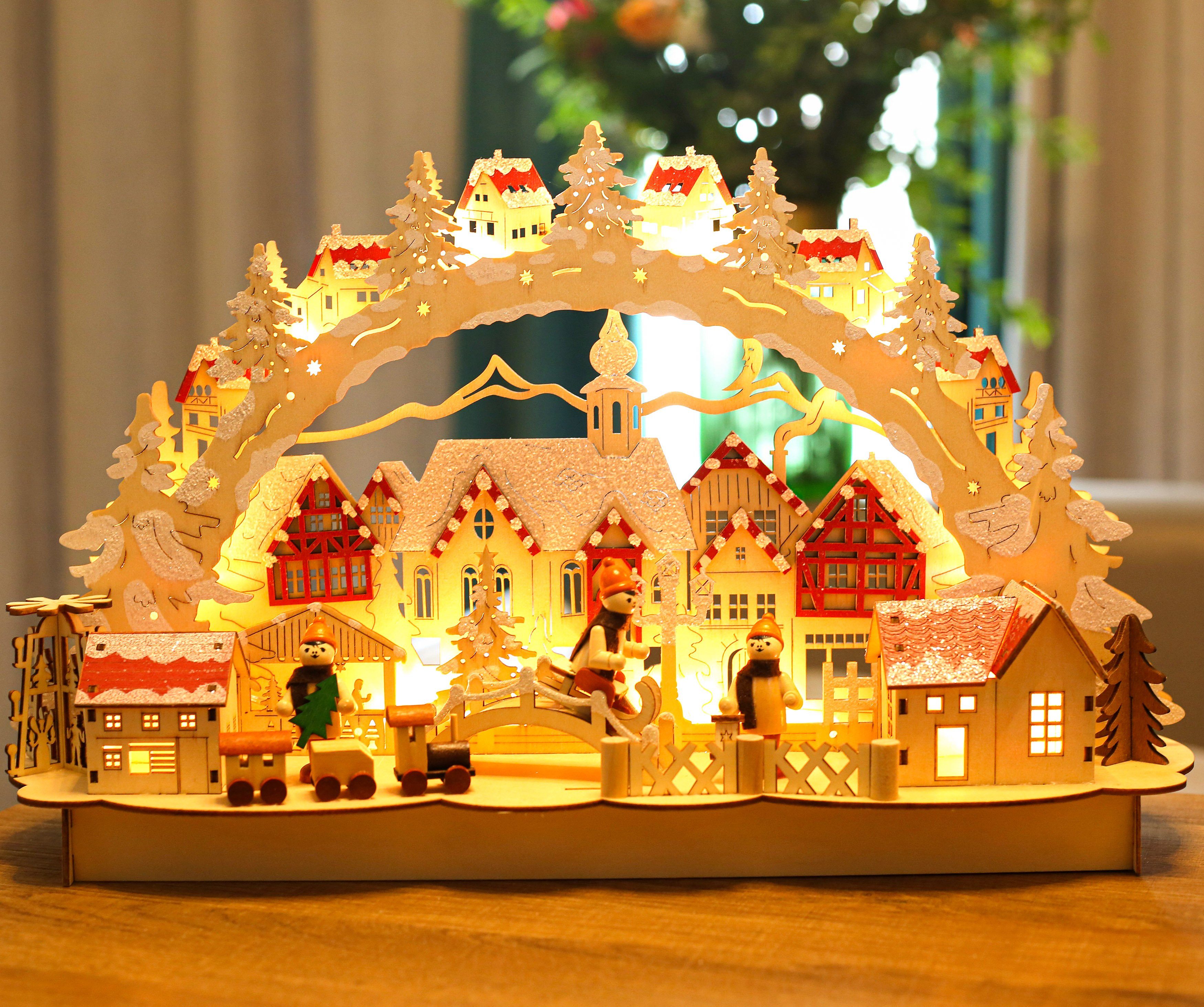 BRUBAKER LED Lichterbogen Schwibbogen - Winterlandschaft mit Altstadt, traditioneller Holzbogen mit 3D Szene beleuchtet handbemalt 27 cm hoch