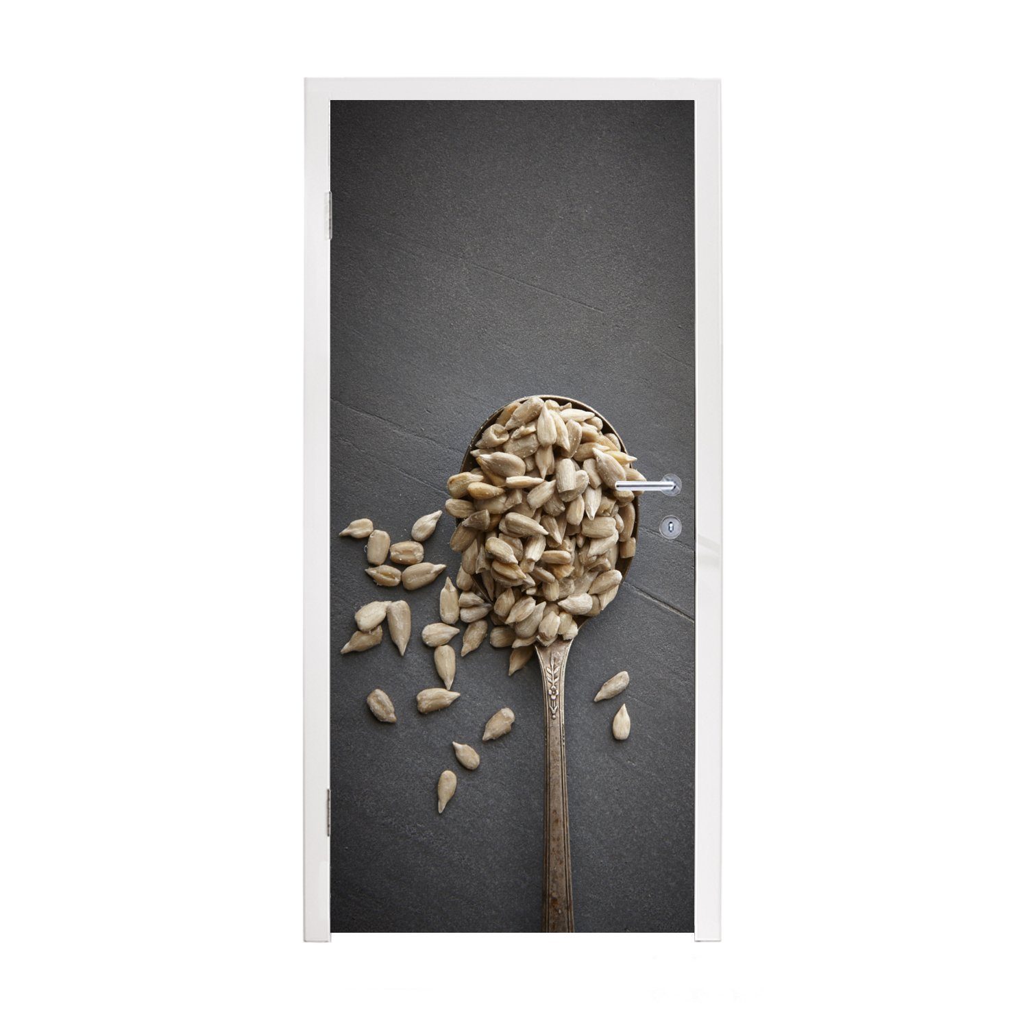 MuchoWow Türtapete Weiße Sonnenblumenkerne auf einer grauen Oberfläche, Matt, bedruckt, (1 St), Fototapete für Tür, Türaufkleber, 75x205 cm