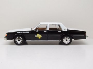 GREENLIGHT collectibles Modellauto Chevrolet Caprice Texas Department Public Safety 1987 schwarz weiß, Maßstab 1:18