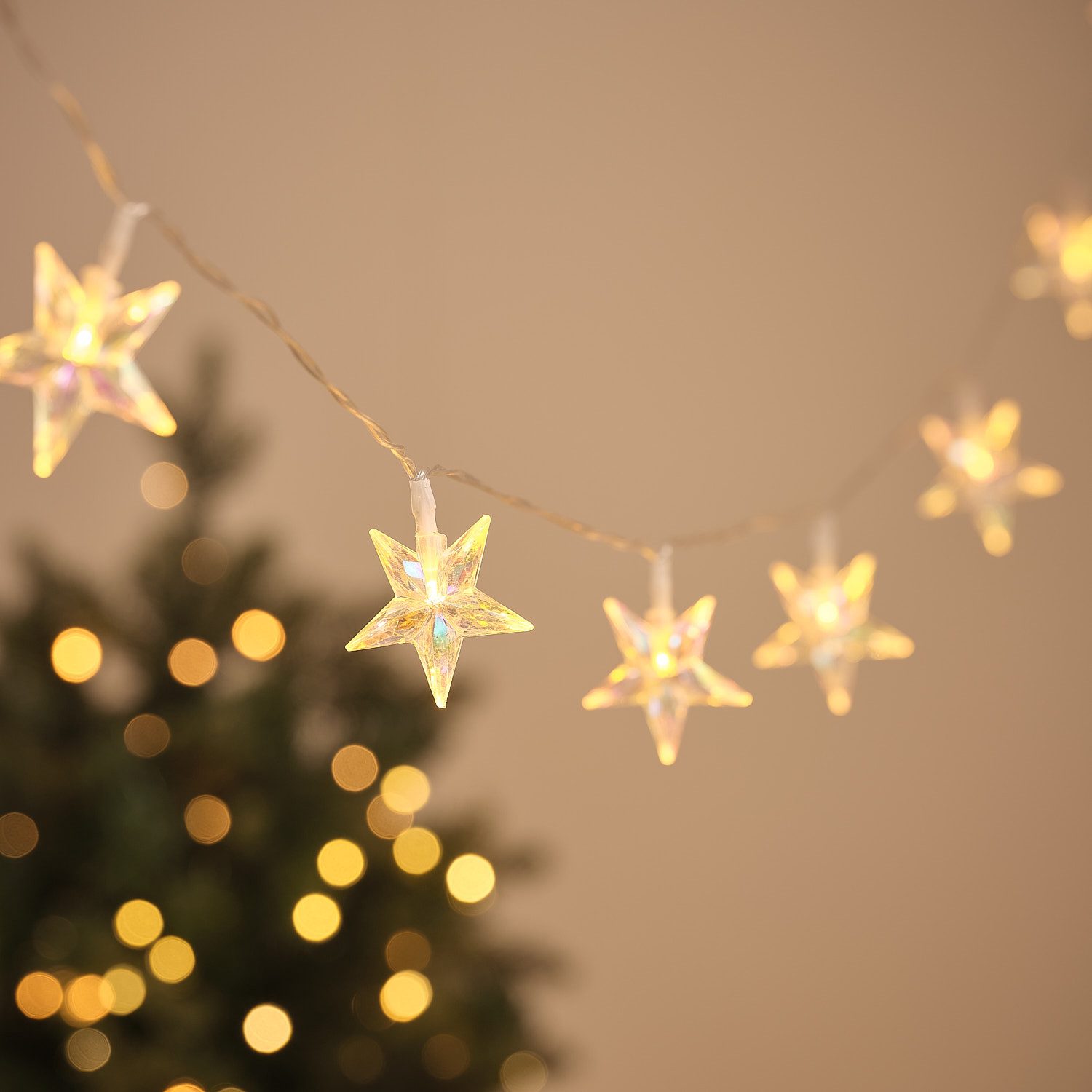 Lights4fun LED-Lichterkette Irisierende 20er LED-Sternenlichterkette in Warmweiß mit Timer