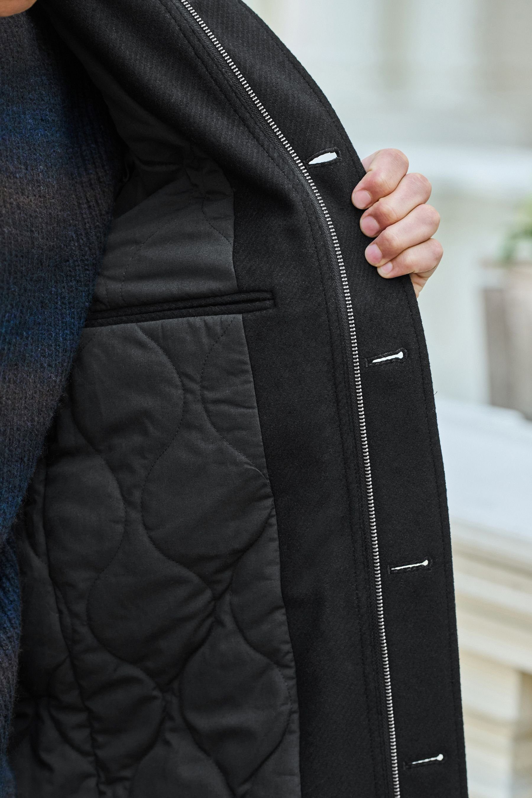 Next Wollmantel Mantel aus Black vier Wollgemisch (1-tlg) Stehkragen mit Taschen