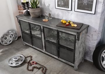 Massivmoebel24 Sideboard HEAVY INDUSTRY (Sideboard im Loft Style, mit verglasten Türen, grau lackiert 180x40x90 Mango montiert), Füße, Rollen und Griffe aus Metall, Factory Look, Industrial Stil, ausgefallenes Industriedesign, struckturierte Holzoberfläche, auffälliges Holzbild, Metallgestell, Metallelemente, Nieten und Verzierungen aus Eisen, Füße,