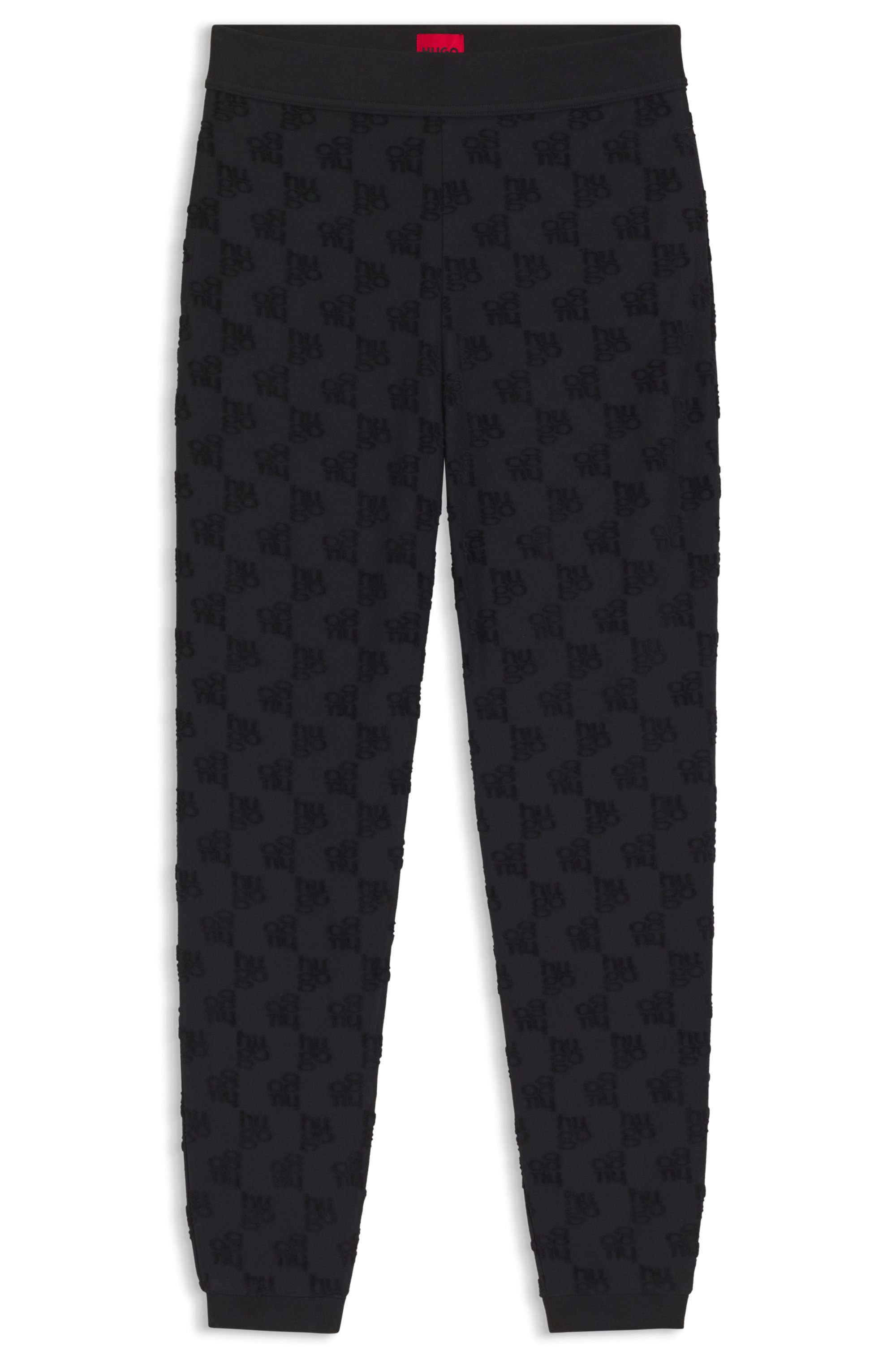 HUGO Jogginghose TERRYMONOGRAM aus Baumwoll-Mix mit Allover-Logo-Muster, elatstischer Bund
