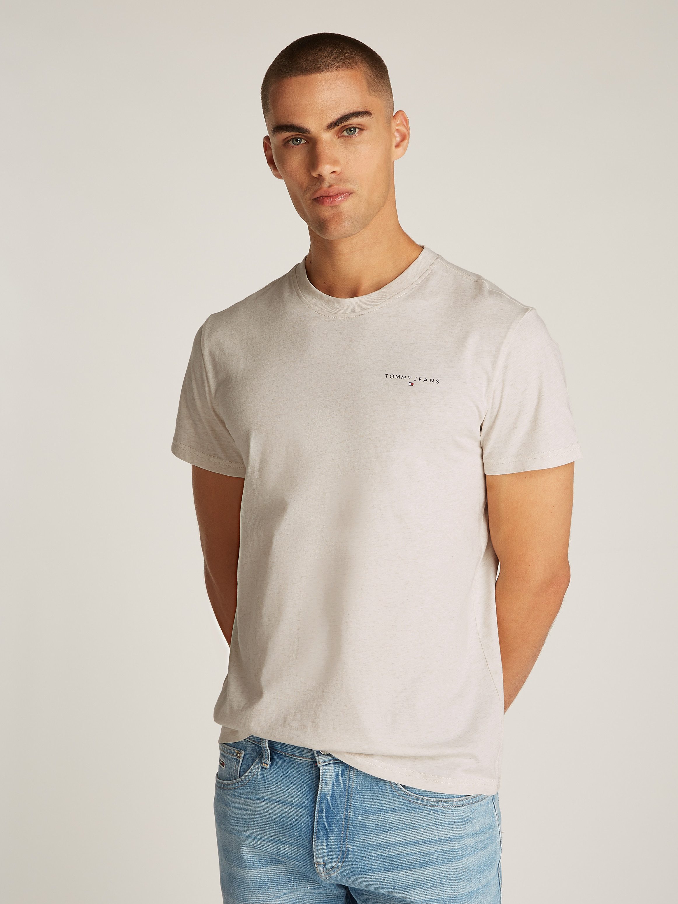 Tommy Jeans T-Shirt TJM SLIM LINEAR CHEST SS TEE EXT mit Logodruck günstig online kaufen