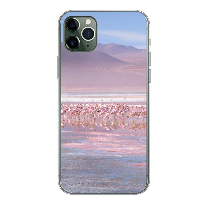 MuchoWow Handyhülle Eine große Gruppe von Flamingos in einer rosa und blauen Landschaft Handyhülle Apple iPhone 11 Pro Max Smartphone-Bumper Print Handy