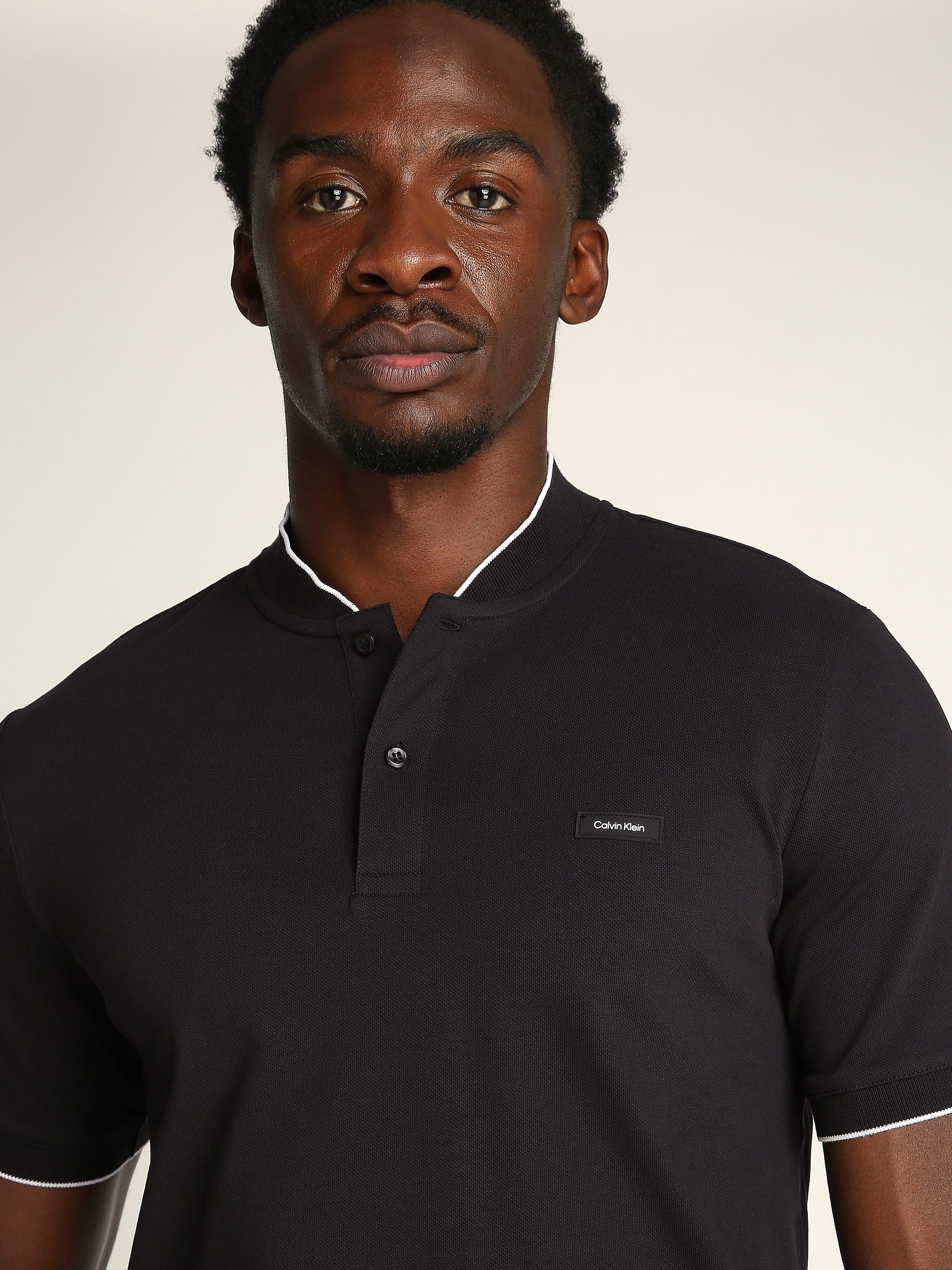 Calvin Klein Poloshirt STRETCH PIQUE STAND COLLAR POLO mit kontrastfarbenen günstig online kaufen