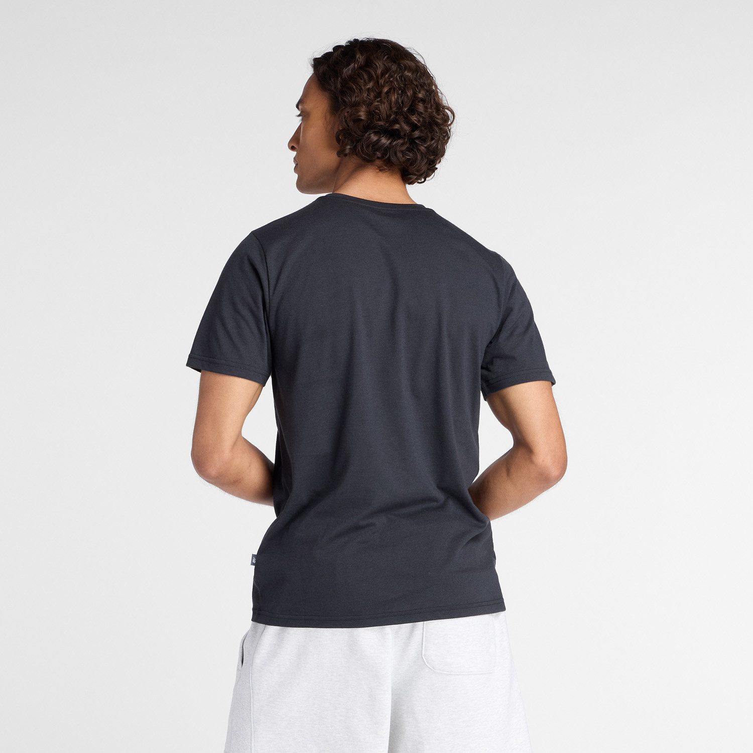 New Balance Trainingsshirt Heathertech Graphic T-Shirt 2 BLACK atmungsaktives Material, schnell trocknend, auch in großen Größen
