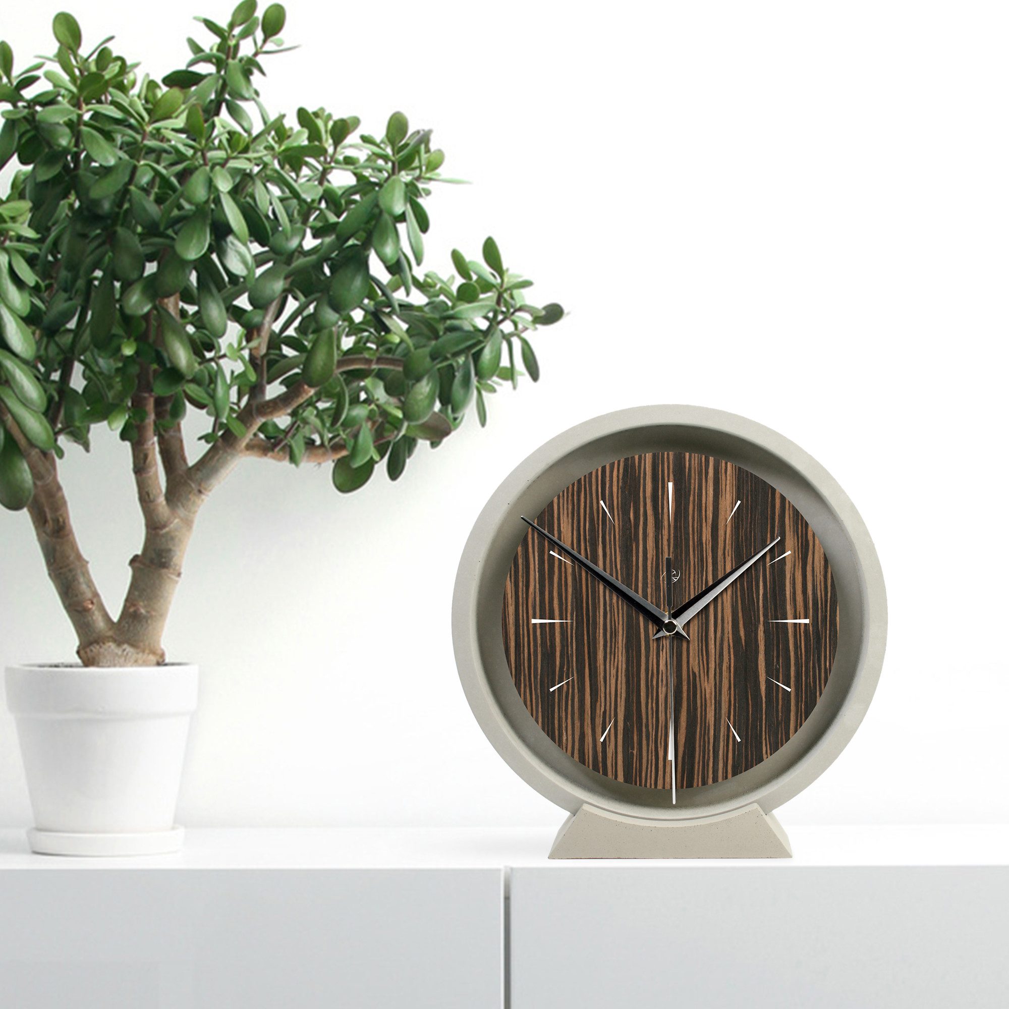 Kreative Feder Standuhr Tischuhr aus Beton günstig online kaufen