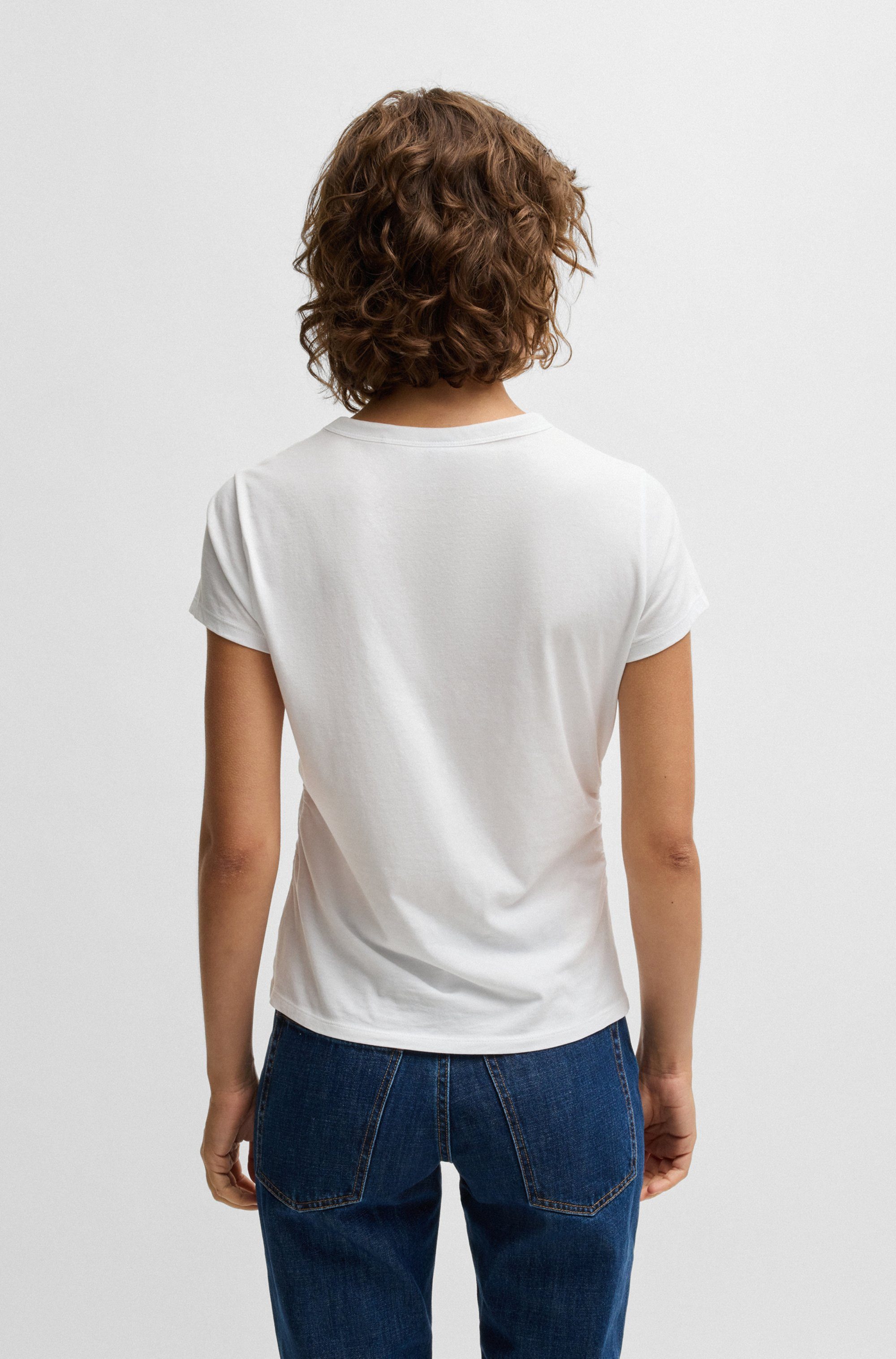 BOSS ORANGE T-Shirt Endora Premium Damenmode mit Raffungen, glitzerndes Bad günstig online kaufen