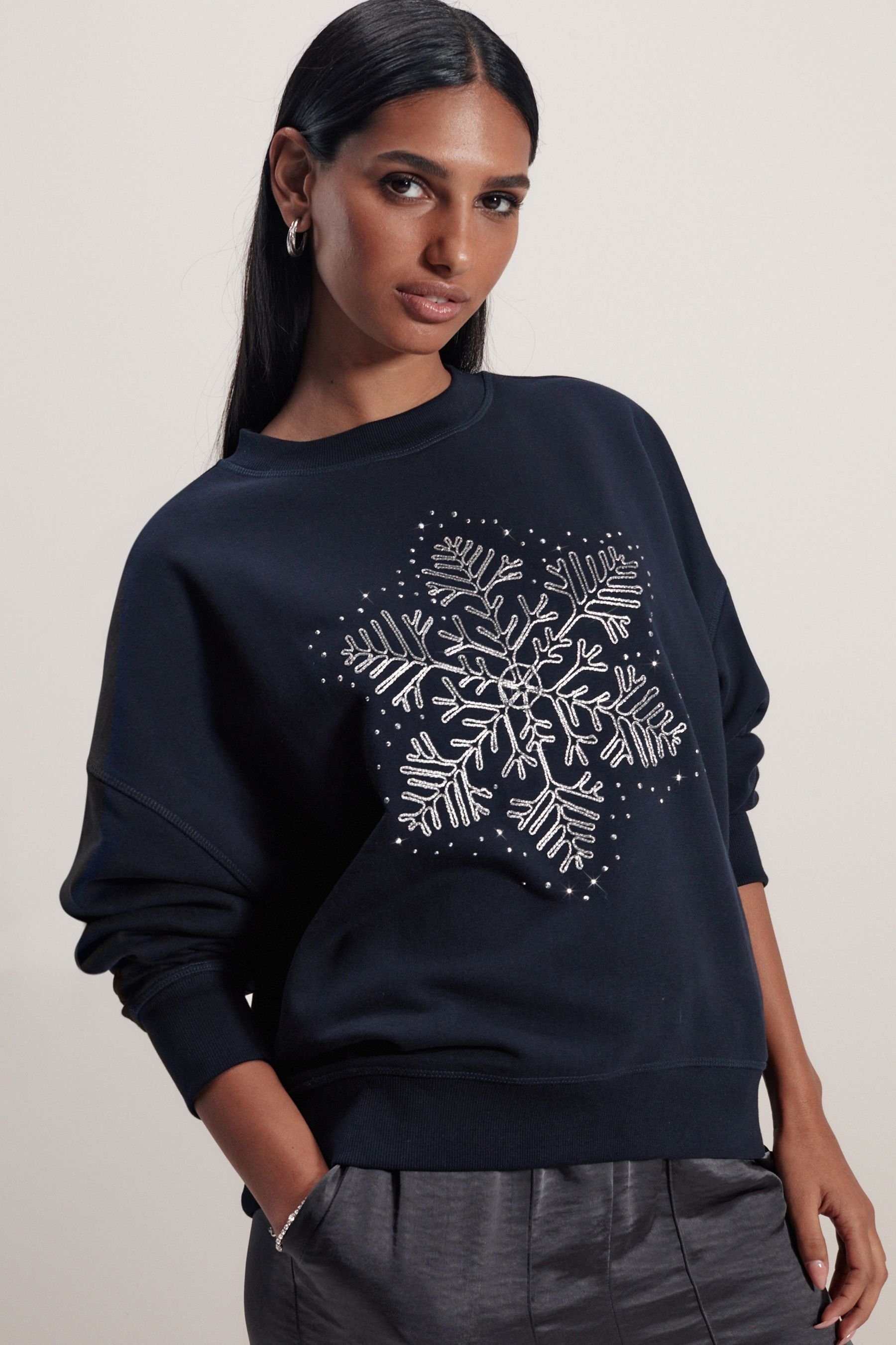 Glitzernder Sweatshirt (1-tlg) mit Weihnachtspullover Schneeflocken Next