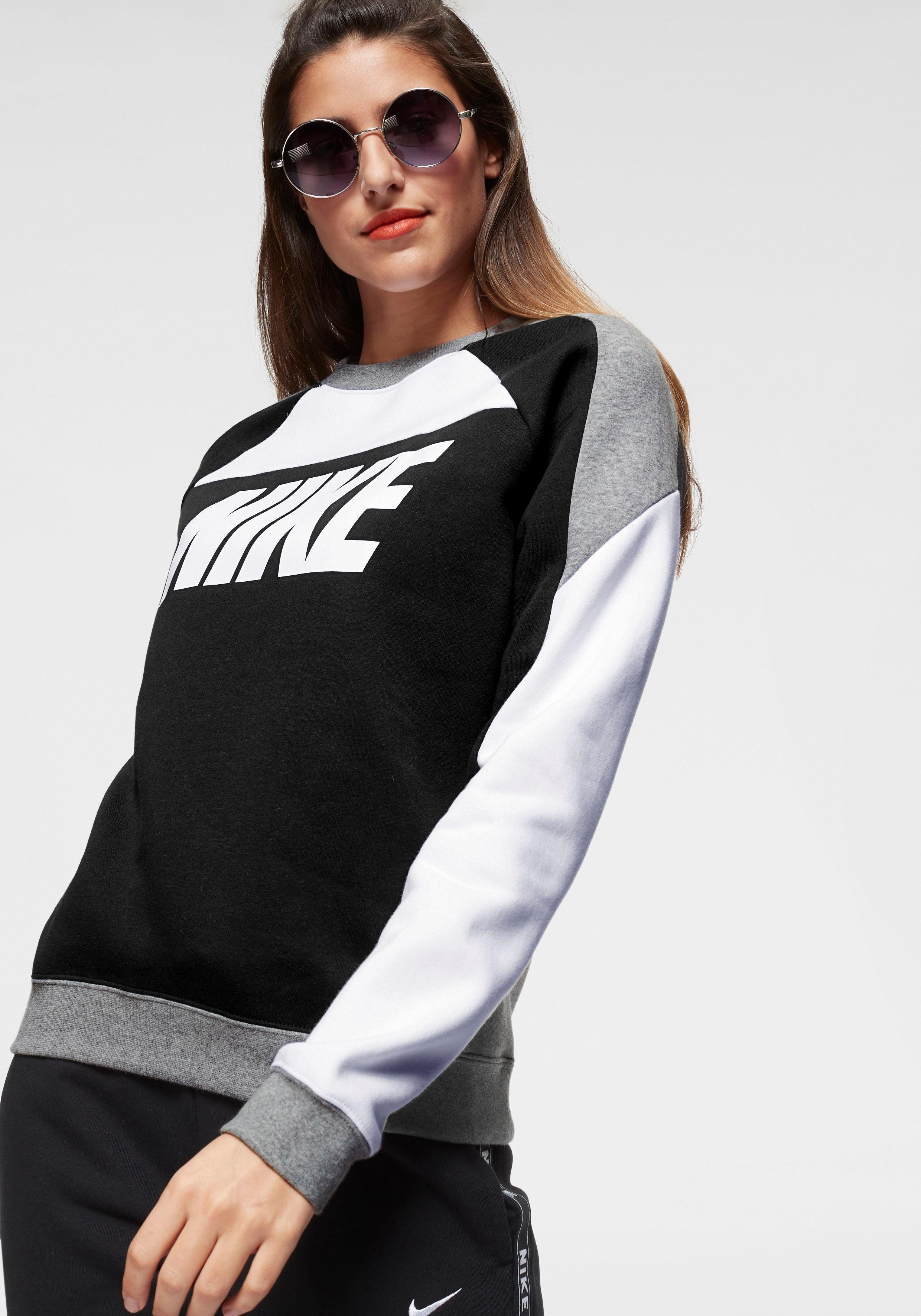 nike women's sportswear tracksuit