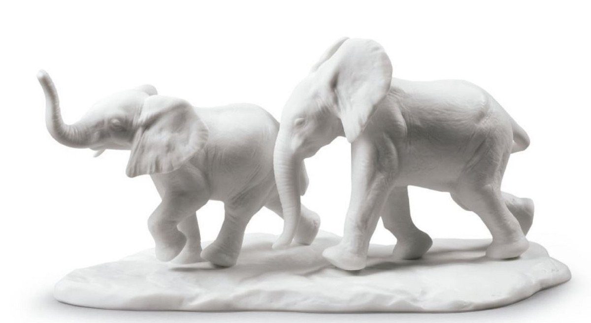 Casa Padrino Dekofigur Casa Padrino Luxus Elefanten Figur / Skulptur Weiß 10 x H. 18 cm - Wohnzimmer Dekoration aus Feinstem Spanischen Porzellan | Dekofiguren