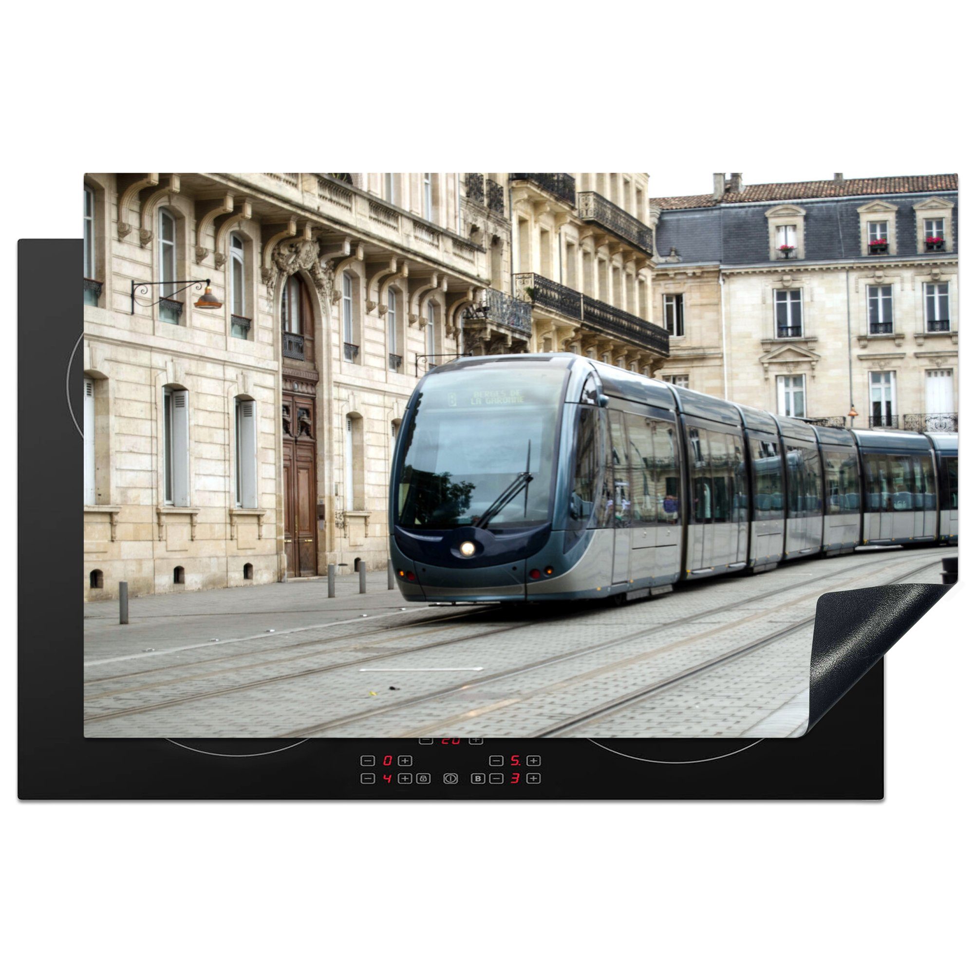 MuchoWow Herdblende-/Abdeckplatte Eine moderne Straßenbahn fährt durch das Zentrum von Bordeaux, Vinyl, (1 tlg), 81x52 cm, Induktionskochfeld Schutz für die küche, Ceranfeldabdeckung