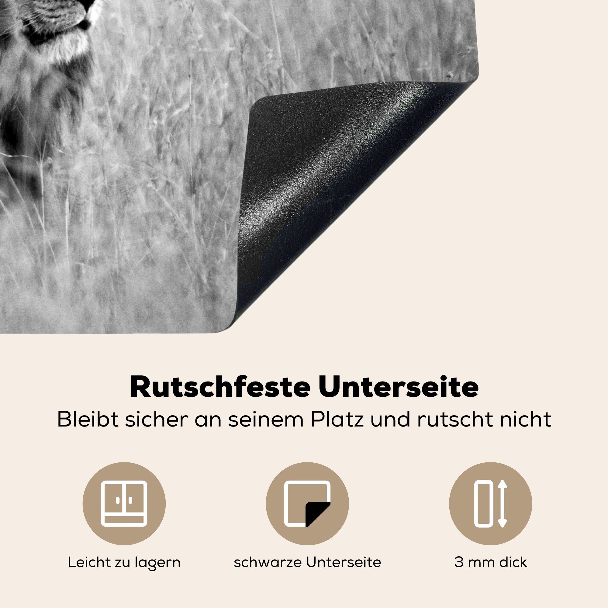 (1 cm, nutzbar, im hohen - Löwe MuchoWow schwarz Mobile 60x52 Gras Arbeitsfläche Herdblende-/Abdeckplatte Vinyl, tlg), weiß, und Ceranfeldabdeckung