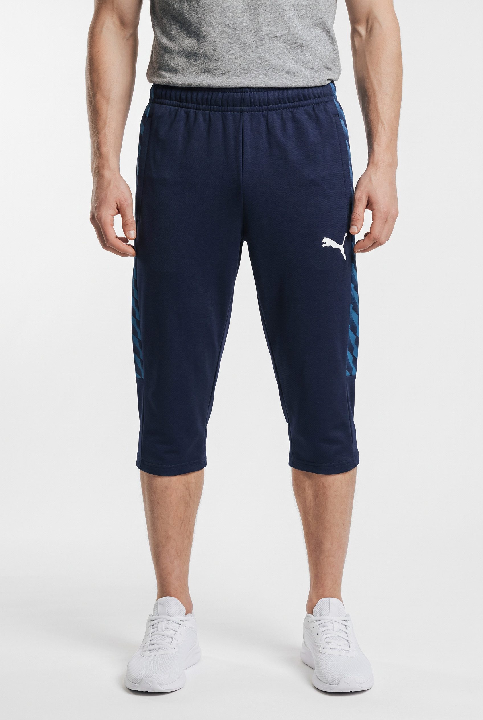PUMA Trainingshose TEAMLIGA26 TRAINING 34 PANTS atmungsaktives Material, mit Reißverschlusstaschen