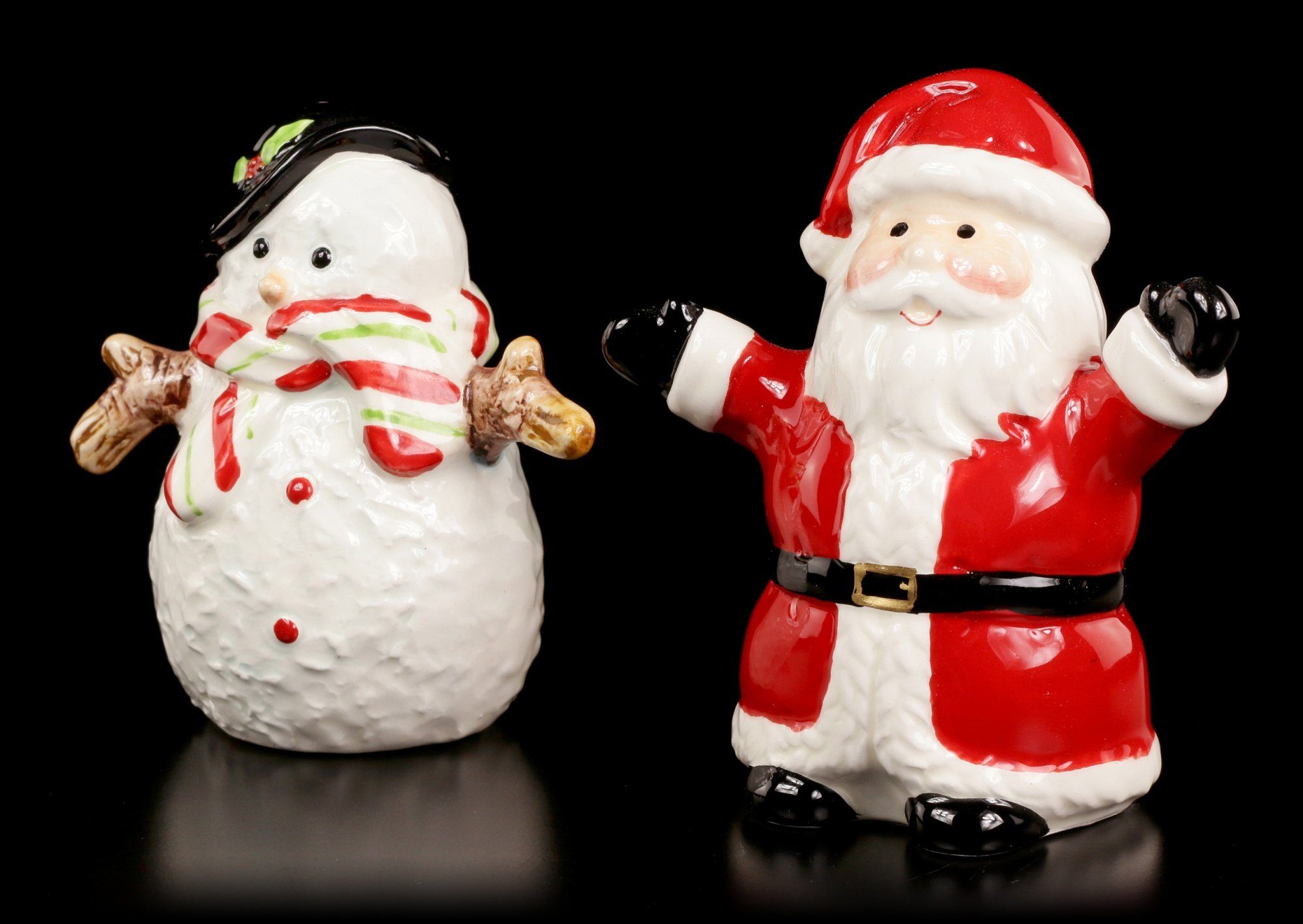 Figuren Shop GmbH Weihnachtsfigur Salz und Pfeffer Streuer - Schneemann & Weihnachtsmann Weihnachtsdeko (2 St)