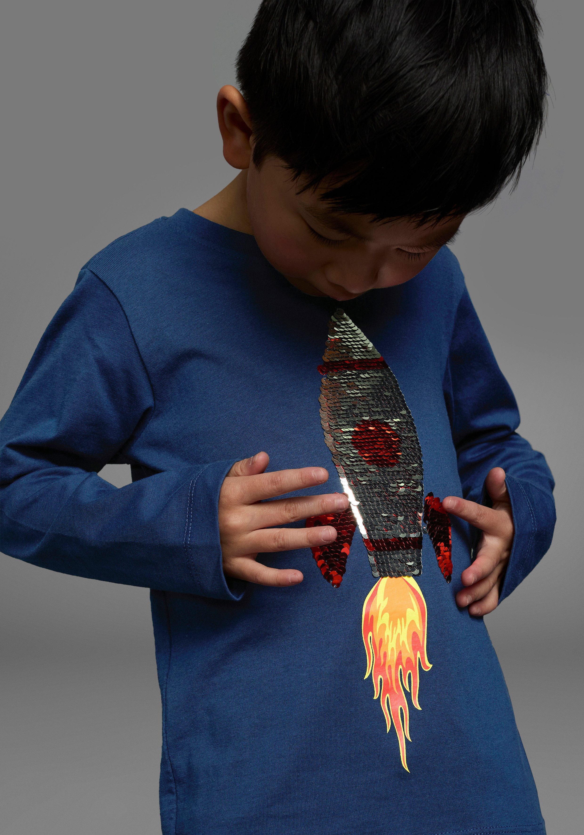 KIDSWORLD Langarmshirt Rakete aus Wendepailletten langärmelige, Basic-Passform, aus Jerseystoff, aus Baumwolle