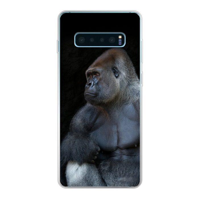 MuchoWow Handyhülle Ein muskulöser Gorilla auf schwarzem Hintergrund Phone Case Handyhülle Samsung Galaxy S10+ Silikon Schutzhülle