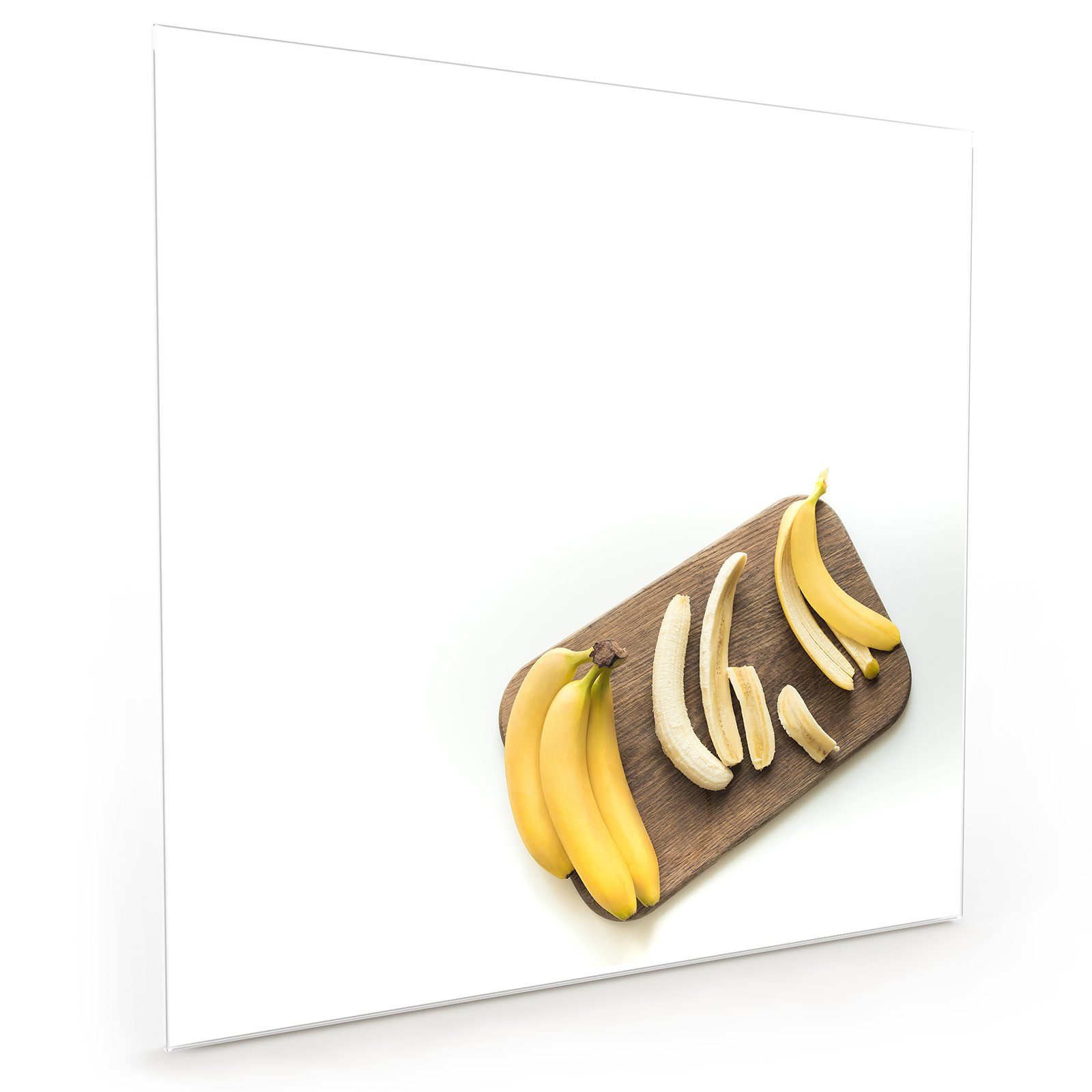 Primedeco Küchenrückwand Küchenrückwand Spritzschutz Glas mit Motiv Bananen auf Brett