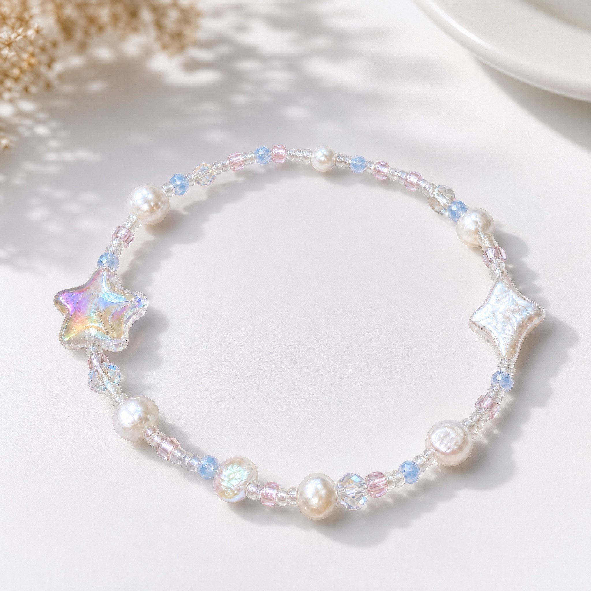 The Beauty House Armband Perlenarmband aus Kunststoff mit Stern-Anhänger