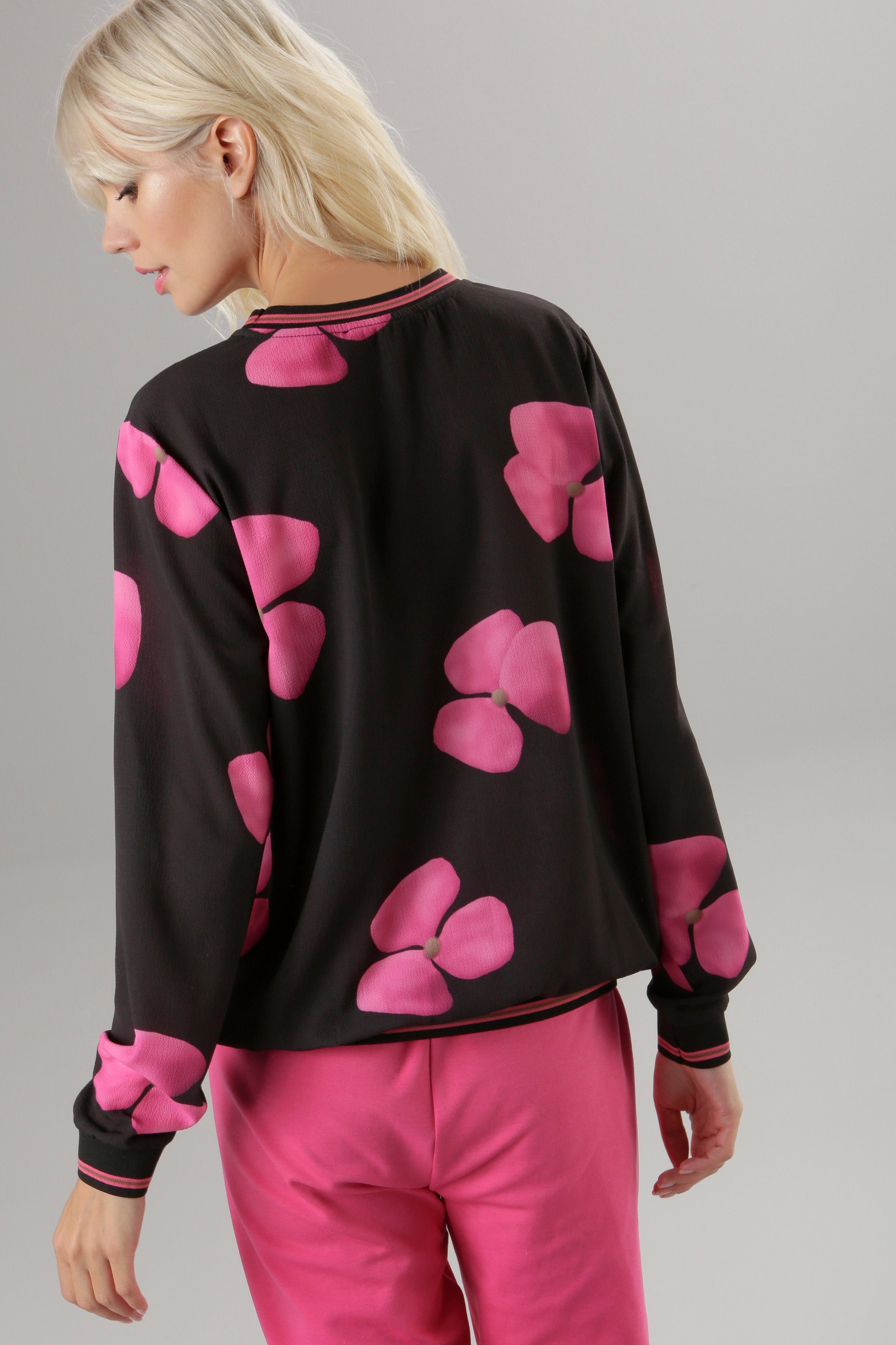 Aniston SELECTED Schlupfbluse mit Blütendruck und gestreiften Bündchen günstig online kaufen