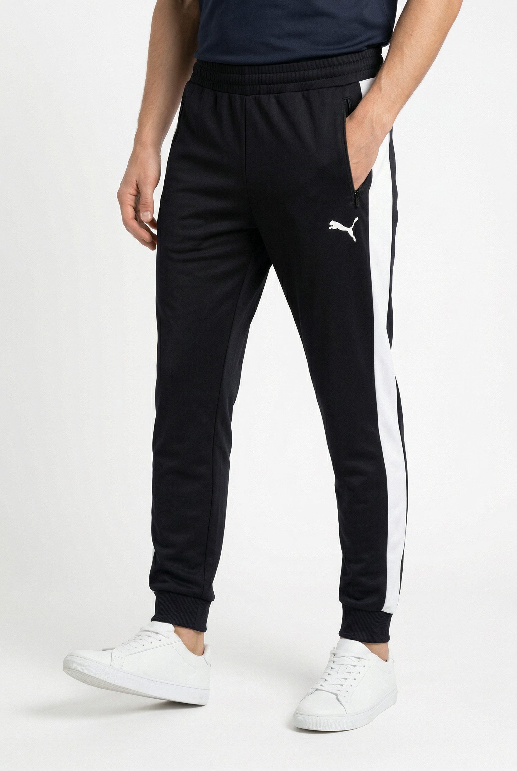 PUMA Trainingshose T7 FOUNDATION CL POLY KNITTED PANTS mit Eingrifftaschen, Regular Fit, sportlicher Stil