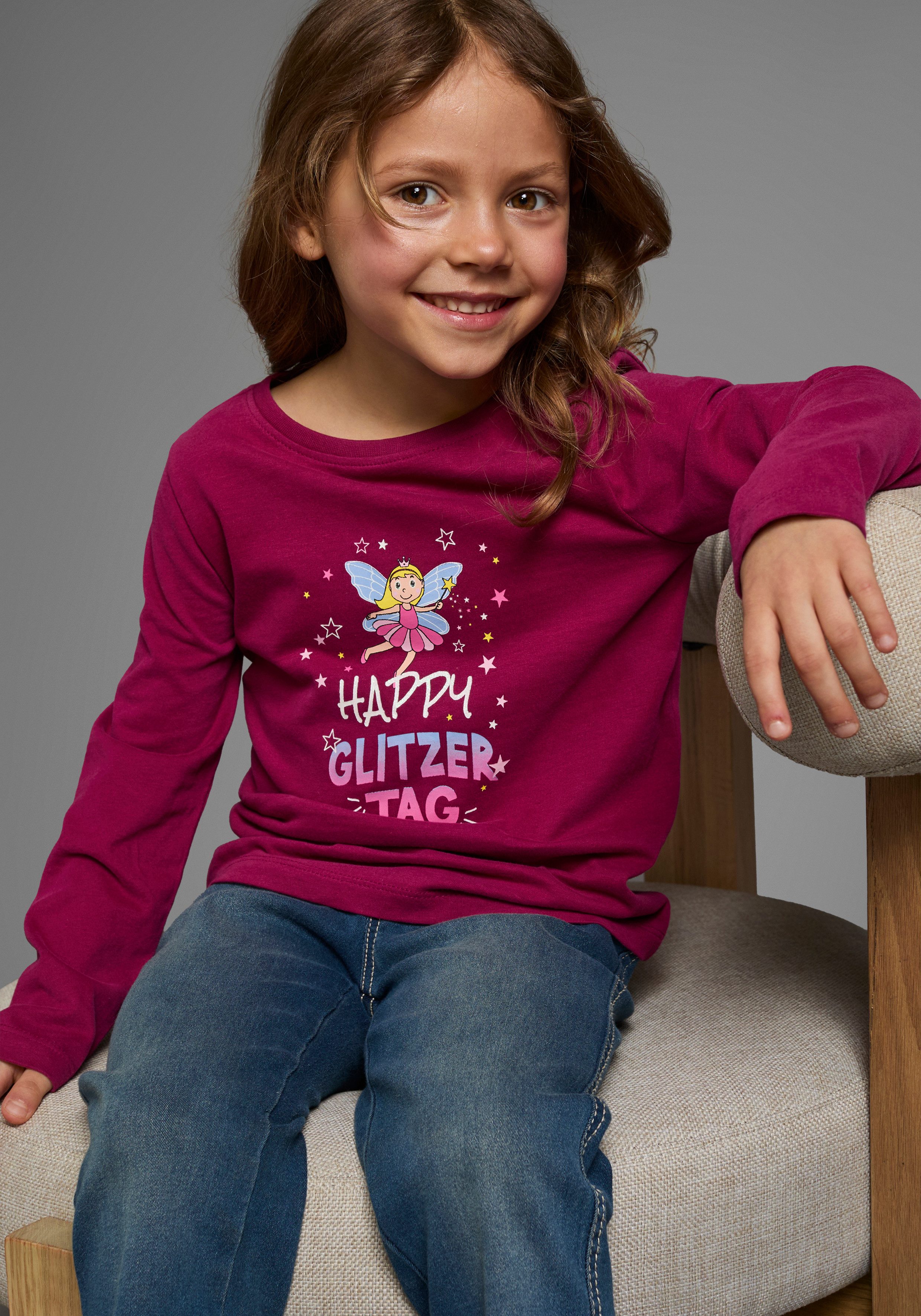 KIDSWORLD Langarmshirt Mit Spruch: Happy Glitzer Tag Langarm, hüftlange Passform, Rundhalsausschnitt