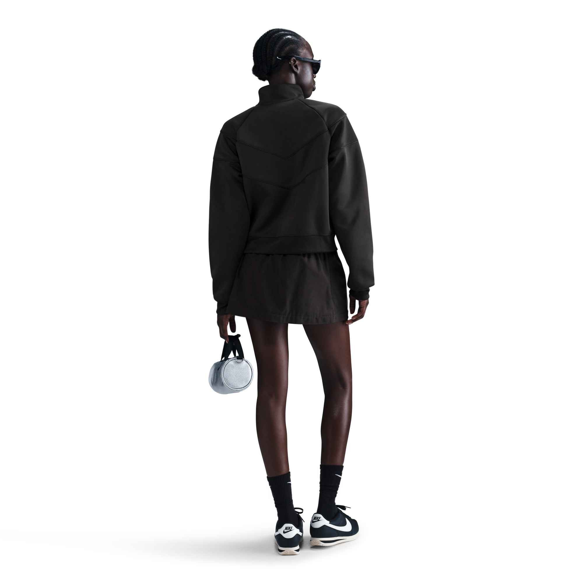 Nike Sportswear Trainingsjacke W NSW NK WR POLY KNIT JKT sportlicher Stil, mit Stehkragen, wasserabweisend, windabweisend