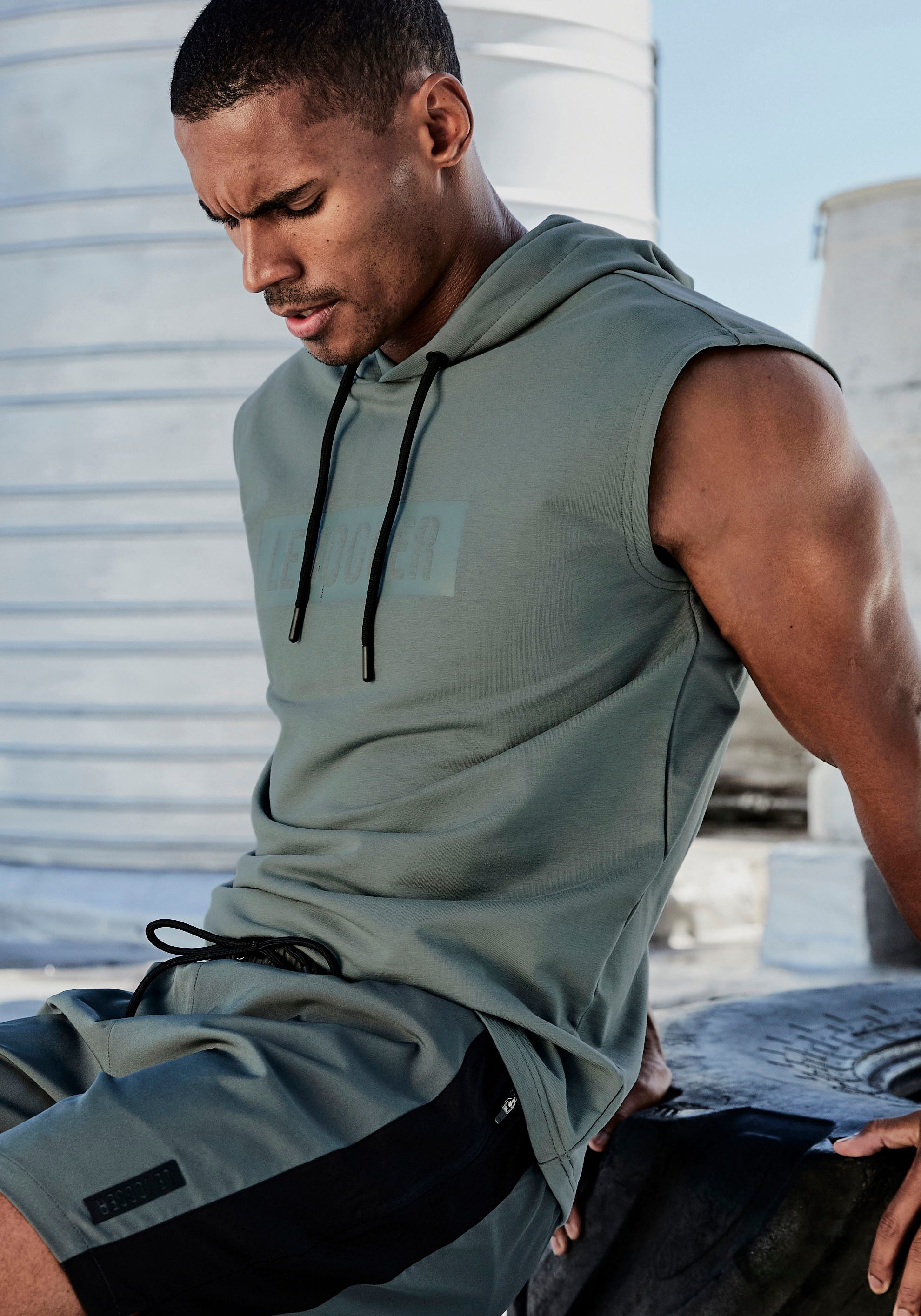le jogger® Kapuzenpullover mit Druck und Kordelzug