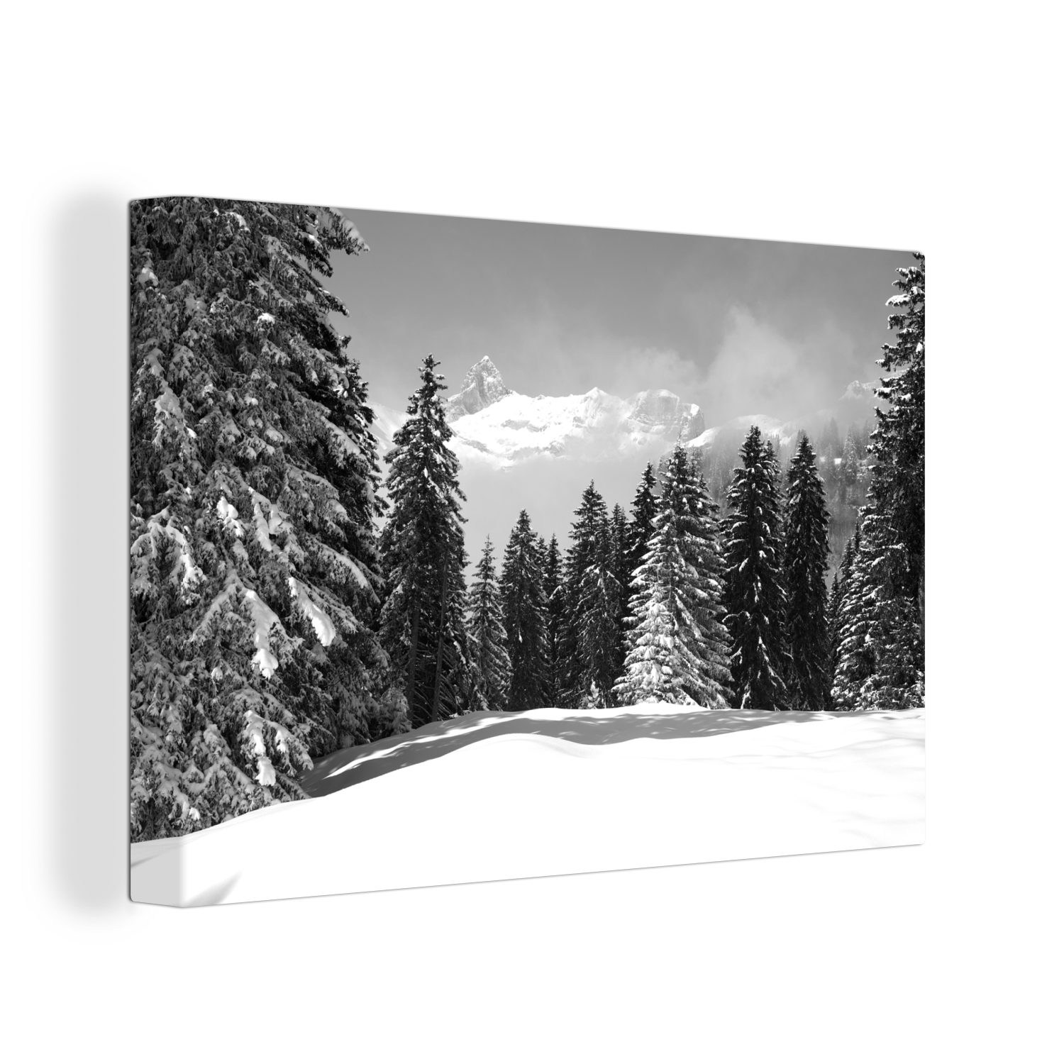 OneMillionCanvasses® Leinwandbild Die schneebedeckten Bäume in den Bergen schaffen eine weihnachtliche, (1 St), Wandbild Leinwandbilder, Aufhängefertig, Wanddeko, 30x20 cm