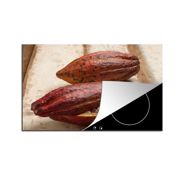 MuchoWow Herdblende-/Abdeckplatte Tropische Kakaobohnenschote auf einem Holztisch Vinyl (1 tlg) induktionskochfeld Schutz für die küche Ceranfeldabdeckung