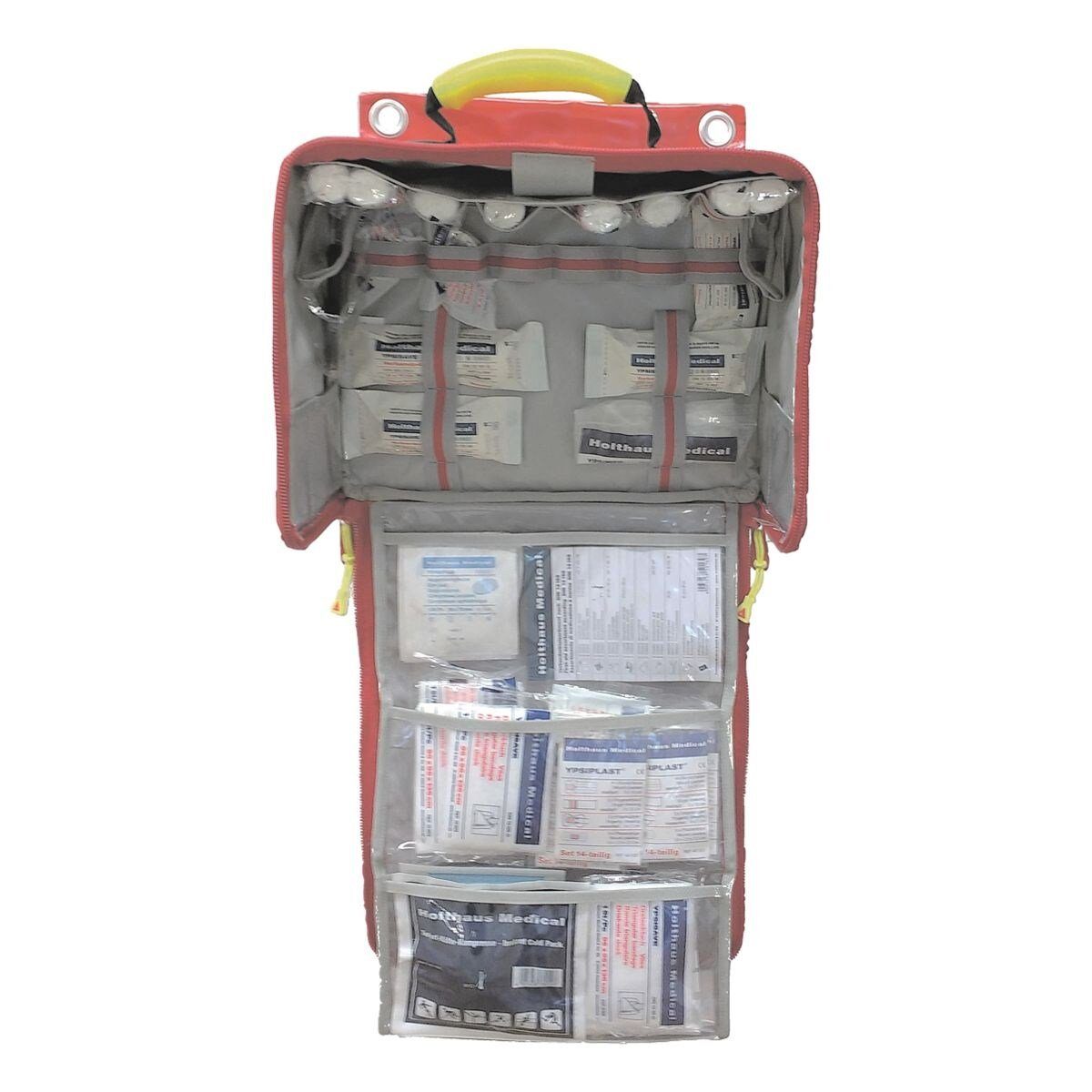 Holthaus Medical Erste-Hilfe-Set Paramedic, Wandtasche mit Füllsortiment nach DIN 13169, mit Reflektorstreifen